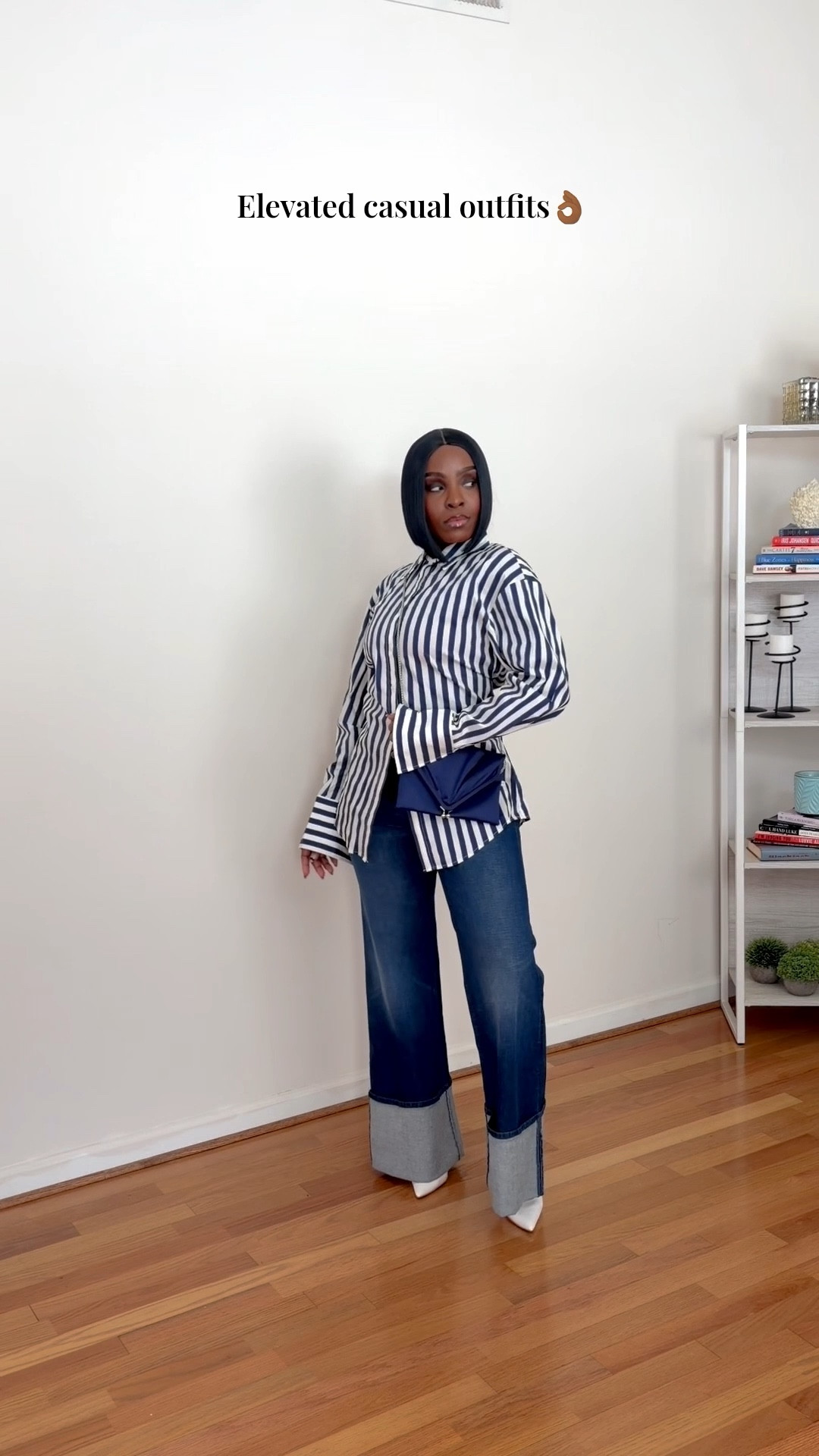 Striped button-down shirt
	•	Oversized striped blouse
	•	Blue and white striped shirt
	•	Waist-tie shirt styling
	•	Belted button-down look
	•	Statement shirting outfit

Bottoms & Silhouette
	•	Wide-leg denim jeans
	•	Cuffed hem jeans
	•	Dark wash wide-leg jeans
	•	Structured denim trousers
	•	High-waisted wide-leg jeans

Styling & Aesthetic
	•	Elevated casual outfit
	•	Effortless chic style
	•	Modern classic fashion
	•	Parisian-inspired look
	•	Smart casual women’s outfit
	•	Tailored yet relaxed style
	•	Minimalist fashion aesthetic

Workwear / Occasion Keywords
	•	Chic workwear outfit
	•	Creative office style
	•	Business casual women
	•	Casual Friday outfit
	•	Day-to-night outfit idea
	•	Brunch outfit inspiration

Accessories & Finishing Touches
	•	White pointed-toe heels
	•	Minimalist shoe styling
	•	Structured mini bag
	•	Sleek bob hairstyle
	•	Polished everyday look