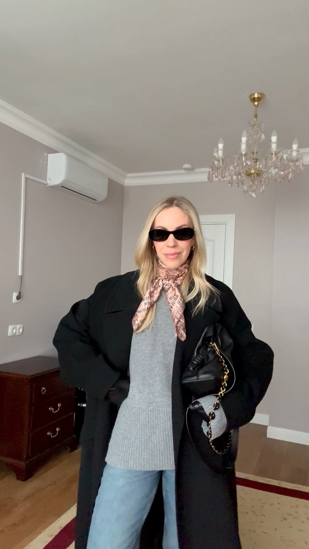 Minimal style, CBK style, black oversized wool coat, silk scarf, cigarette jeans, Loewe Flamenco pouch handbag 

#LTKOver40 #LTKootd #LTKSeasonal