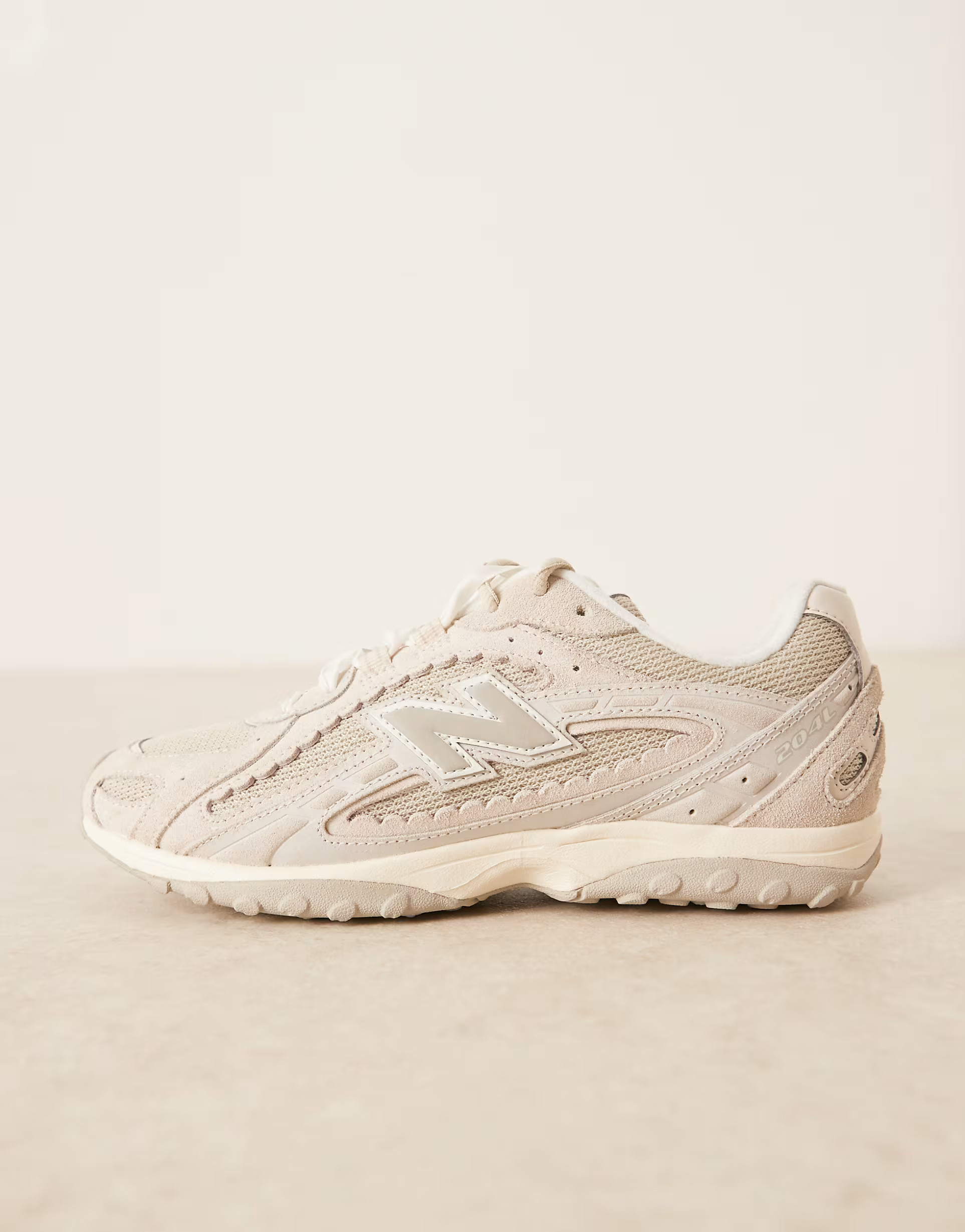 \u203a New Balance 204L scalloped sneakers in cream suede | ASOS (Global)