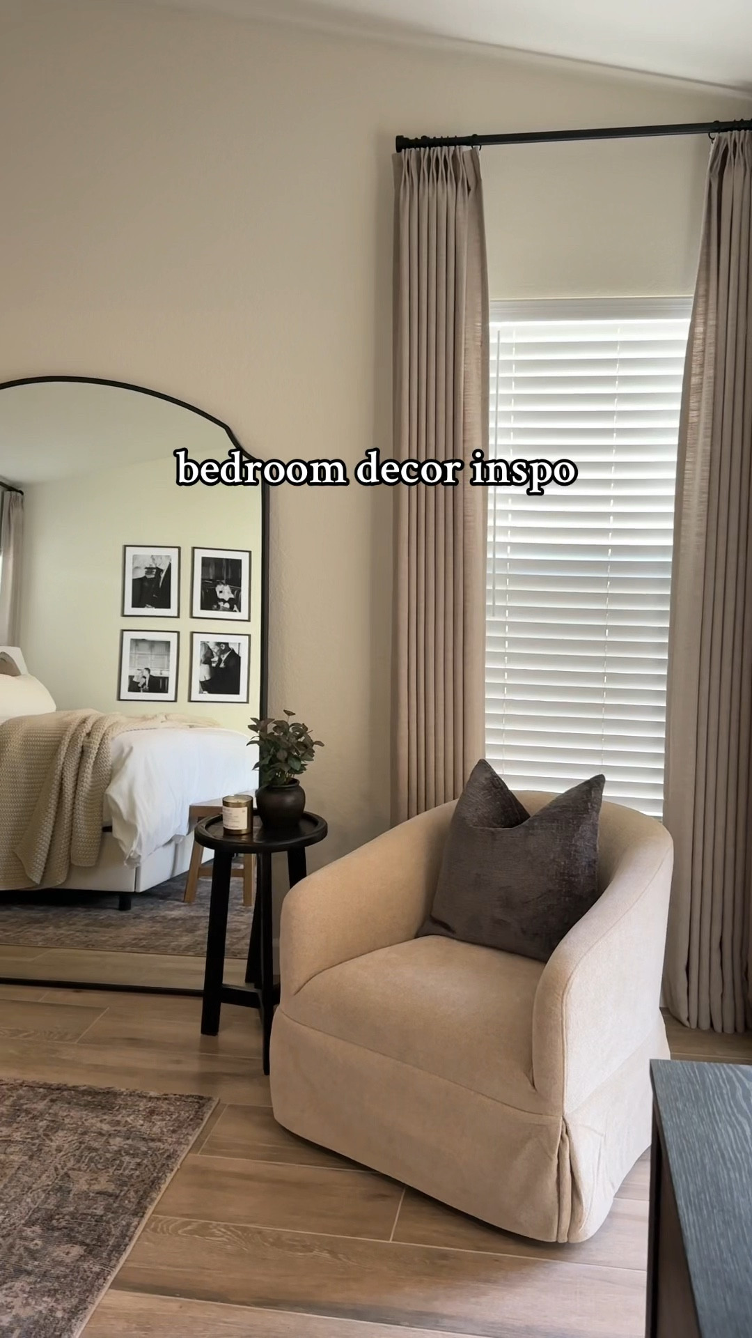 Neutral/earth tone bedroom decor ideas. Neutral colors in the bedroom provide such a serene and calming feel. These taupe drapery panels really warm up the room and tie the whole space together. 
••
Liz linen curtains, custom drapes, Amazon drapes, drapes, drapery panels, linen drapes, linen curtains, bedroom inspo, neutral room decor, neutral bedroom, taupe curtains, pinch pleat curtains, master bedroom, primary bedroom, how to decorate bedroom, how to style bedroom, apartment bedroom decor, moody bedroom decor, cozy bedroom, neutral aesthetic, brown home decor, brown bedroom, earth tones, earthy decor, organic modern, modern bedroom, modern home, decorating ideas, decorating inspo, bedroom decor inspo, upholstered bed frame, wood nightstands, black nightstands, wood bench, wood end of bed bench, swivel chair, bedroom chair, floor mirror, large mirror, oversized floor mirror 

#LTKWatchNow #LTKFindsUnder100 #LTKHome
