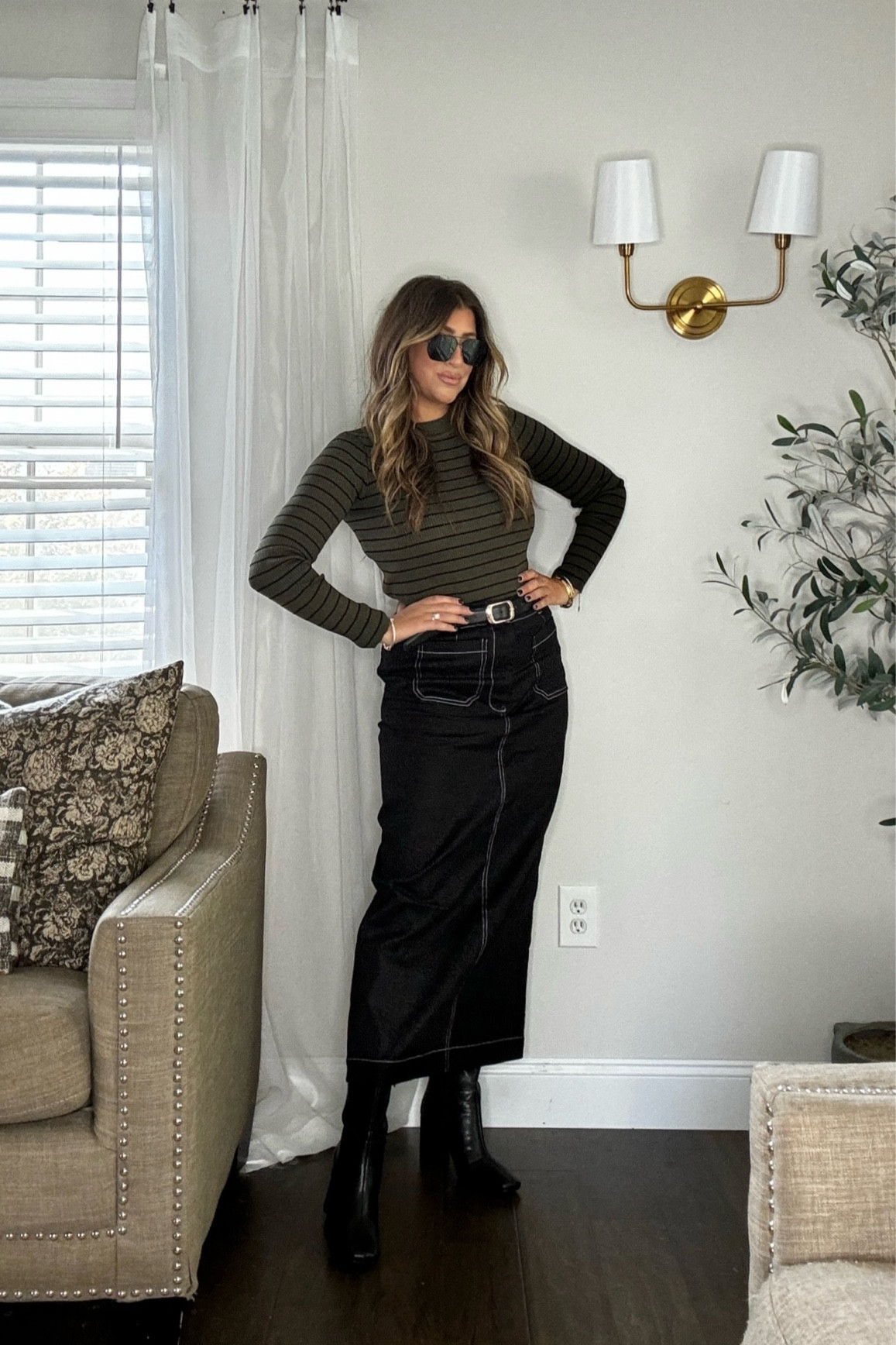 The cutest fall midi skirt! Love the black and white stitching with this olive stripped top. Wearing meds and tts 8 in skirt. Could have sized down. Use code LAURENHORN to save 20%! Xx

#LTKFindsUnder100 #LTKSeasonal #LTKStyleTip