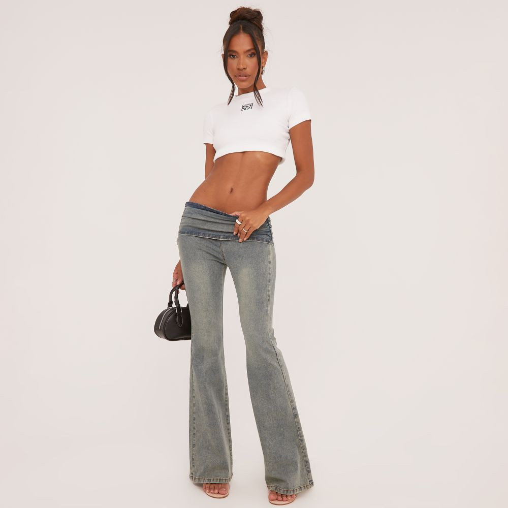 Low Rise Fold Over Waistband Flared Jeans In Washed Blue Denim | EGO (UK)