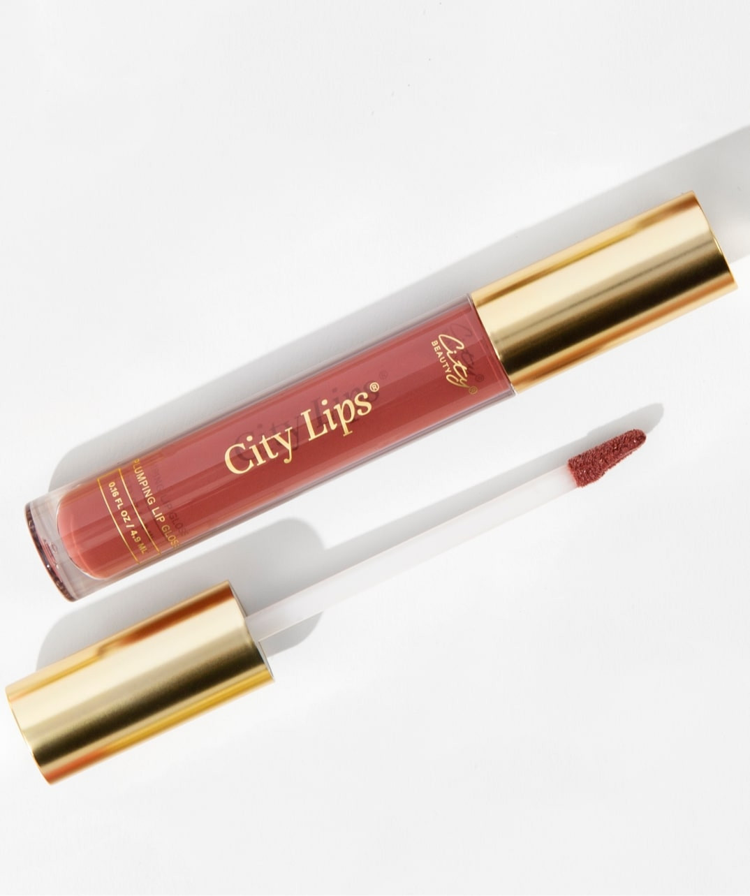 plumping lip gloss | City Beauty