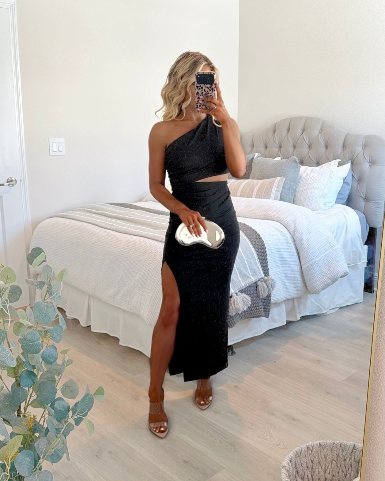 One-shoulder black maxi dress with a side twist cutout detail + high slit styled as a resort dress, vacation dress, party dress, special event dress, + summer date night dress.

#LTKootd #LTKSaleAlert #LTKTravel