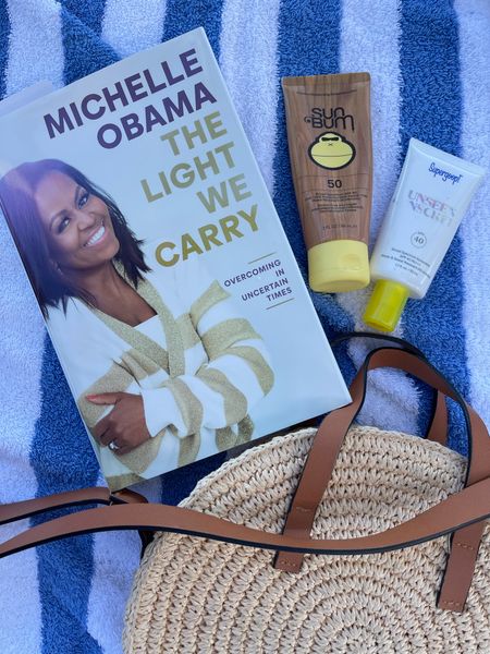 Beach necessities for your next beach vacation: Supergoop! Unseen sunscreen, Sun bum sunscreen, beach bag (round straw bag) & beach book (Michelle Obama, the light we carry) 

#LTKunder50 #LTKtravel