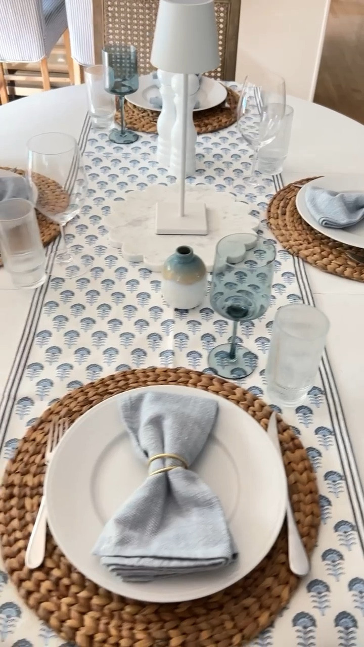 Coastal tablescape ideas including a block print runner, blue and white decor, seagrass chargers, white dishware, blue wine glasses, linen napkins, gold napkin rings, LED touch lamp and scalloped marble board
10/11


#LTKHome #LTKVideo #LTKStyleTip