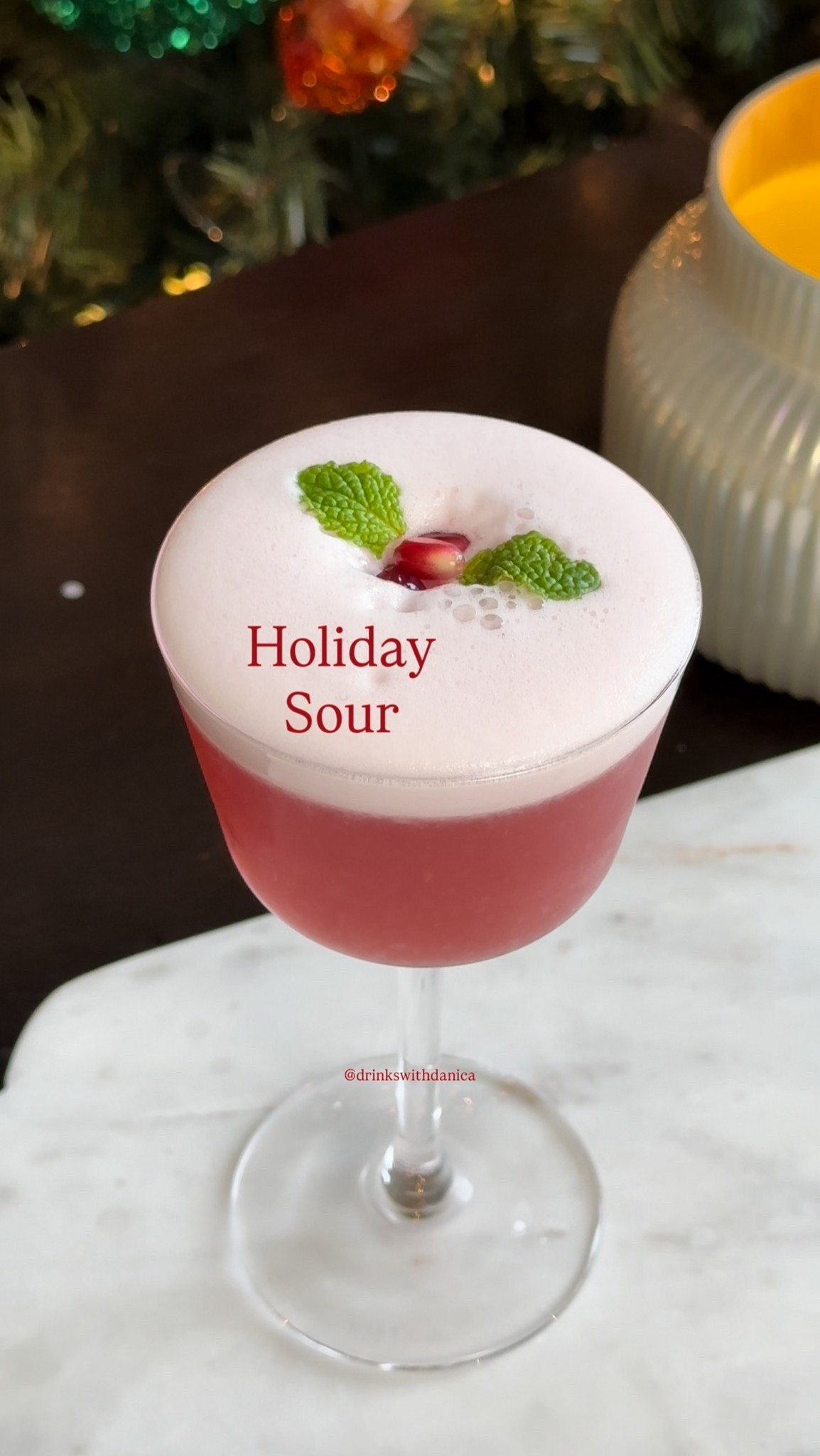 Holiday Sour

Follow me on Instagram and TikTok @drinkswithdanica for this recipe and more. Full recipe can also be found at www.drinkswithdanica.com