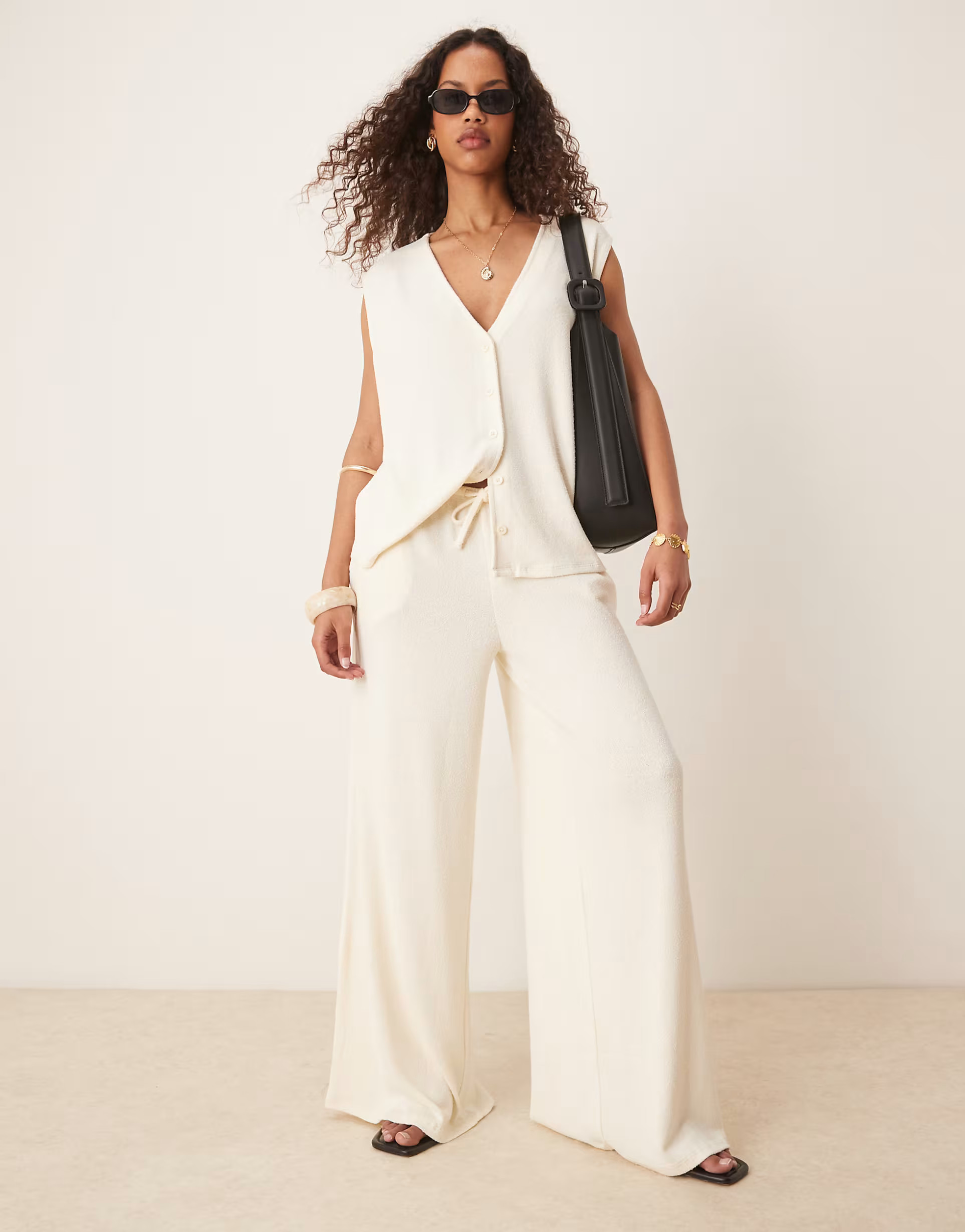 ASOS DESIGN textured knit oversized waistcoat co-ord in cream | ASOS (Global)