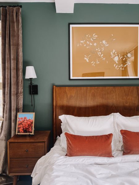 Bedroom mid century modern. Pepper home lumbar pillows. Juniper print shop floral print. Plug in sconces. Velvet curtains. #ltkhome #interiordesign 

#LTKstyletip #LTKSeasonal #LTKhome