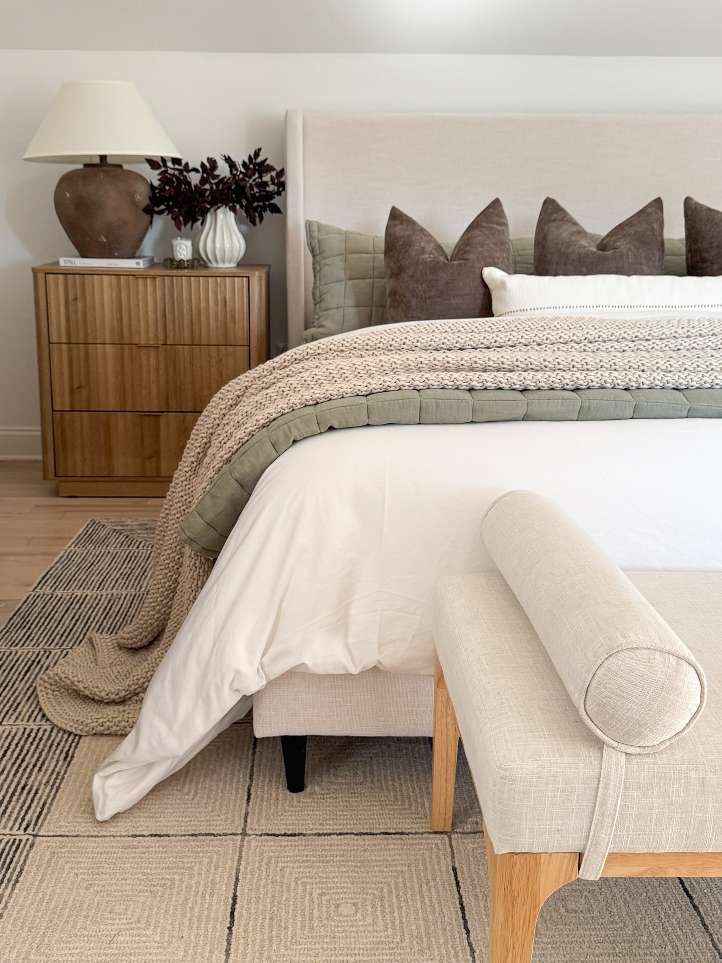 Cozy bedroom layers you’ve been loving most lately. 🤎
My neutral upholstered bed, fluted wood nightstands, and modern wood bench are such timeless staples. Paired with this green quilt, linen throw blanket, and neutral area rug, it’s the perfect mix of cozy and elevated.

Linking everything here so you can shop the full bedroom look ✨

#bedroommakeover #ltkhome #neutralbedroom #cozyhome #modernorganic

#LTKSeasonal #LTKHome #LTKStyleTip