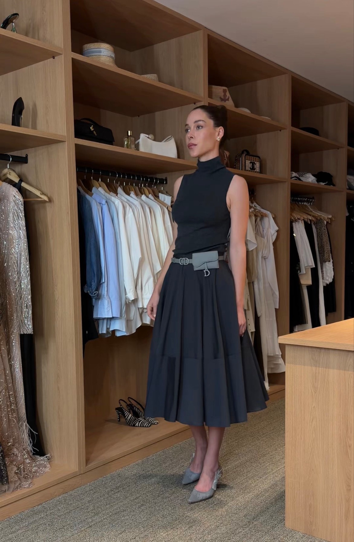 A modern take on timeless lady style.
A fitted turtleneck paired with a structured midi skirt creates that effortless silhouette I always love: elegant, feminine and perfectly polished.

This is the kind of outfit that works everywhere, from a chic lunch to an evening out ,just by switching accessories.

Classic pieces, neutral tones, and a flattering waistline… the formula for understated French elegance.

#LTKspring #LTKeurope #LTKfrance
