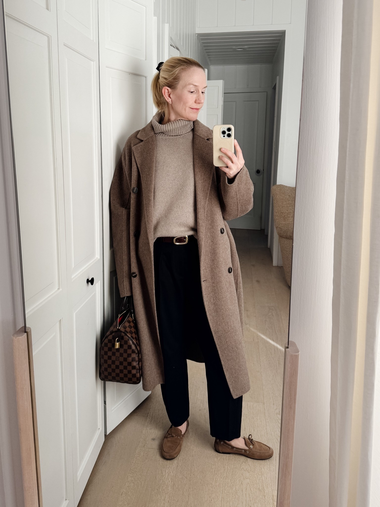 Shades of taupe and black for the perfect Row inspired winter outfit! #winterstyle #minimaliststyle #therow #toteme #speedy30

#LTKSeasonal #LTKWorkwear #LTKOver40