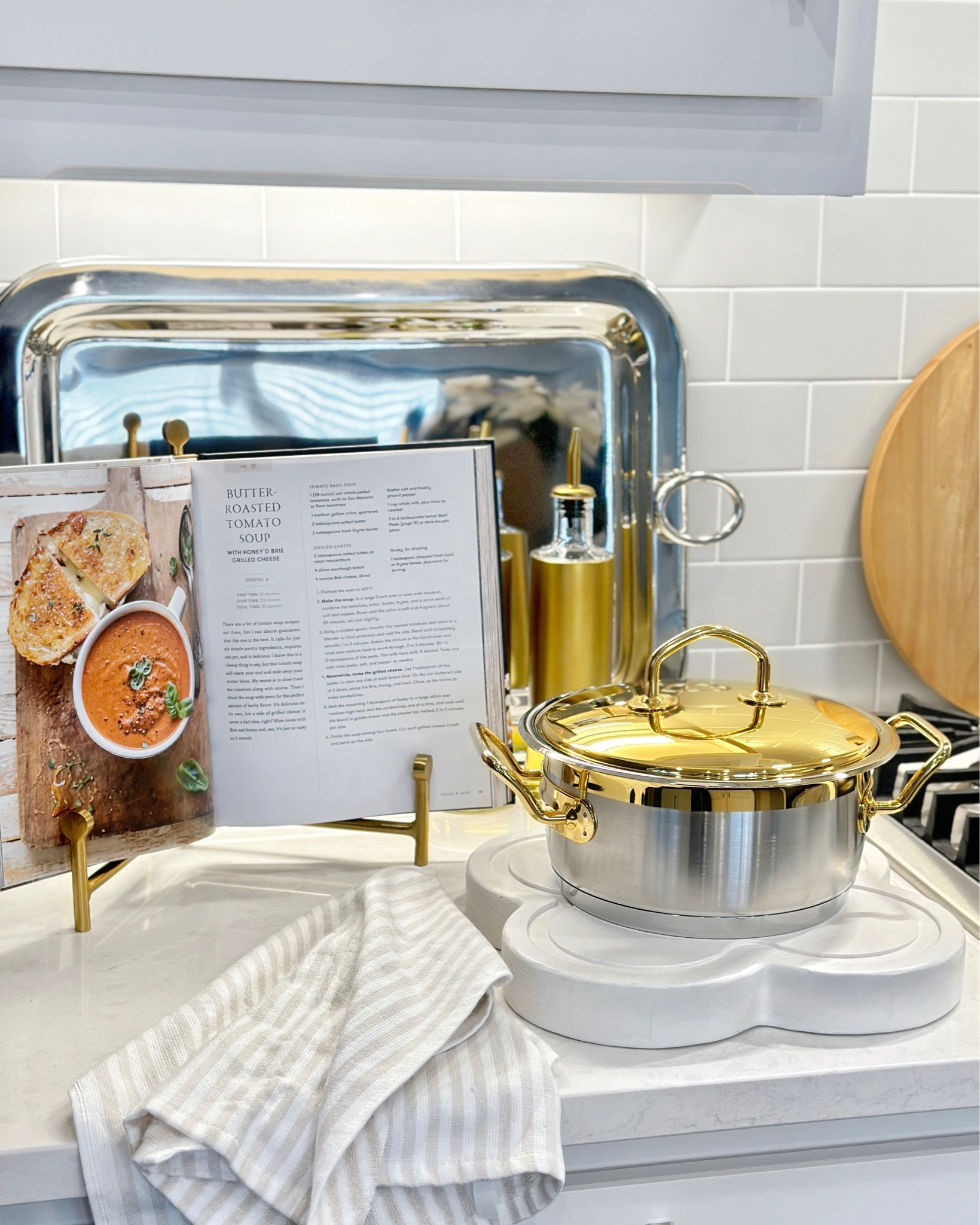 Gold art easel doubles as a cookbook stand 

#LTKFindsUnder50 #LTKHome #LTKSaleAlert