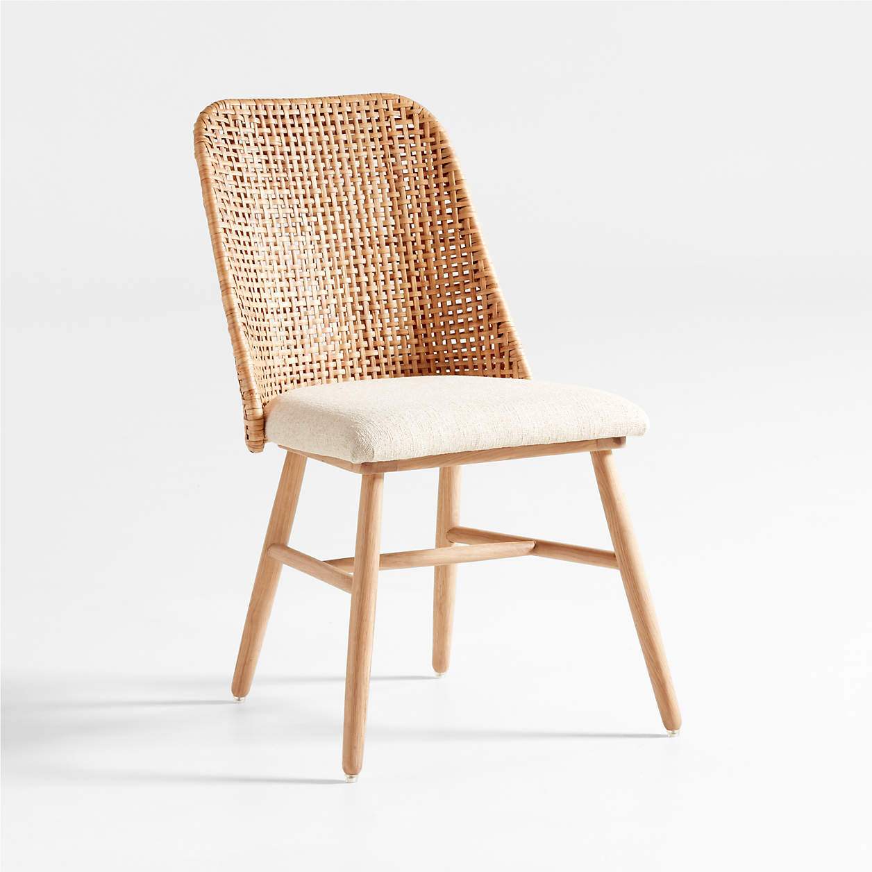 Astrid Upholstered Rattan Dining Chair with Performance Fabric + Reviews | Crate & Barrel | Crate & Barrel