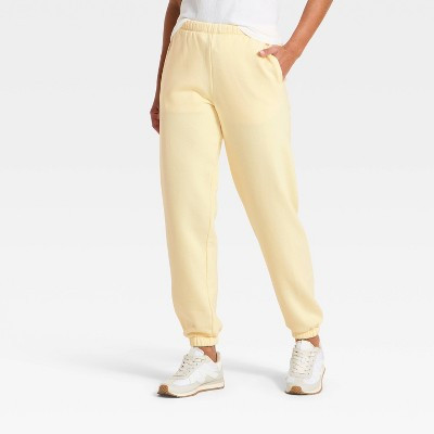 Women's Mid-Rise Fleece Jogger Pants - Universal Thread™ Yellow XL | Target