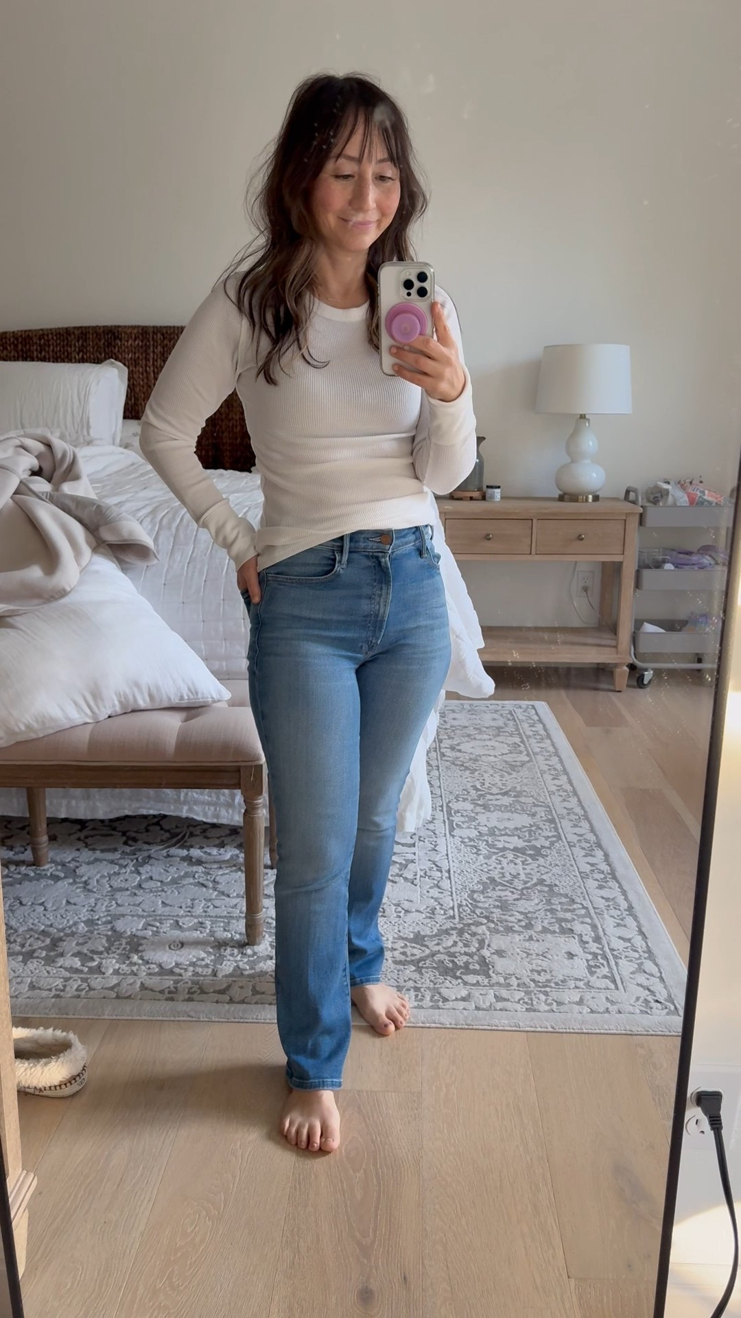 Love these jeans. I’m 5’3” and I get the regular length in 26. This is a size down pair bc of stretch. It’s meant to hit at the ankle, but I like them as like a straight leg type of jean fit  