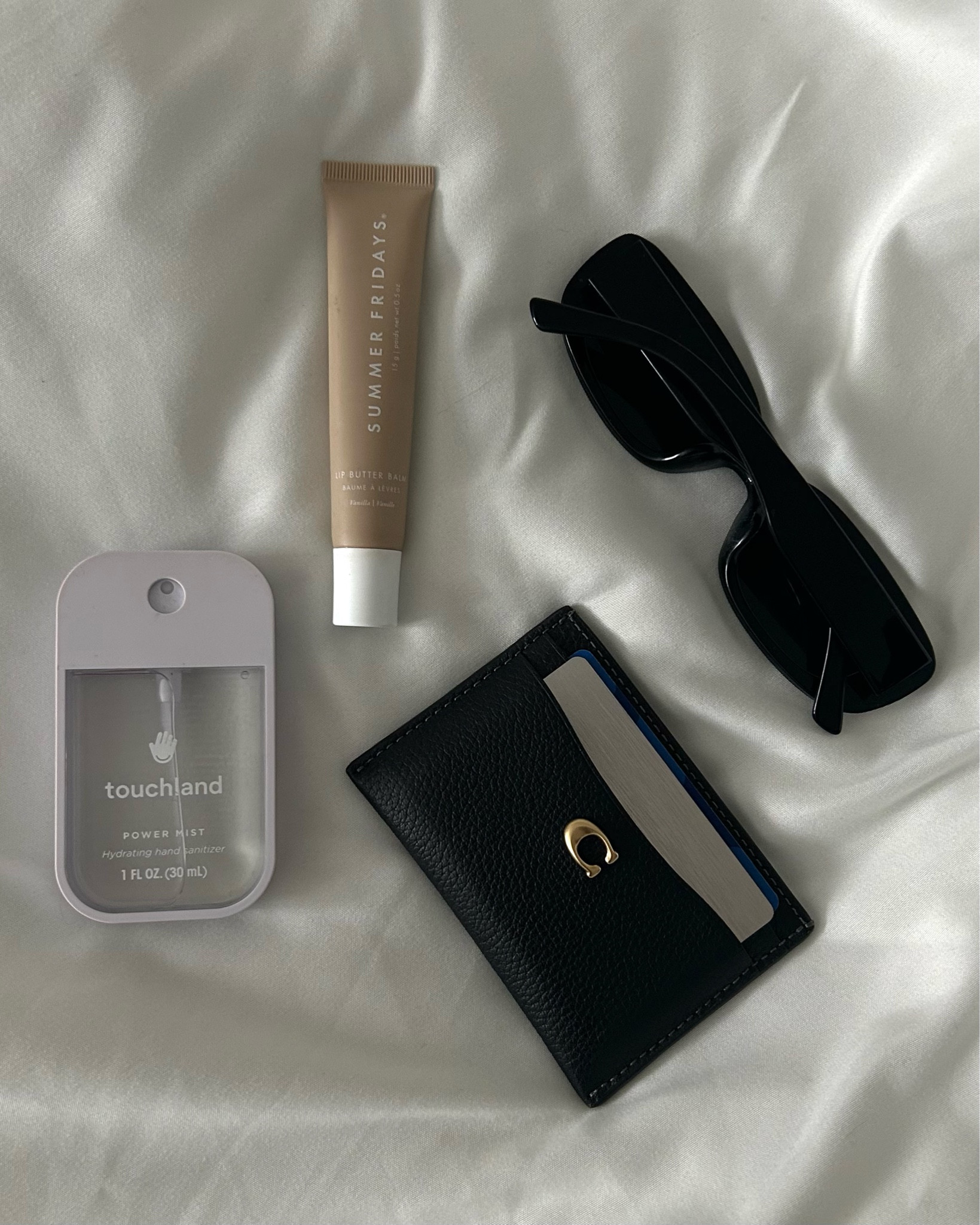 my essentials ft. @coach card holder / @summerfridays lip butter balm / @touchland hand sanitizer in beach coco / @amazon black rectangle sunnies

bag essentials, it girl essentials, clean girl aesthetic, spring style, spring accessories, must haves, what’s in my bag, hollyfrocks

#LTKstyletip #LTKfindsunder50 #LTKtravel