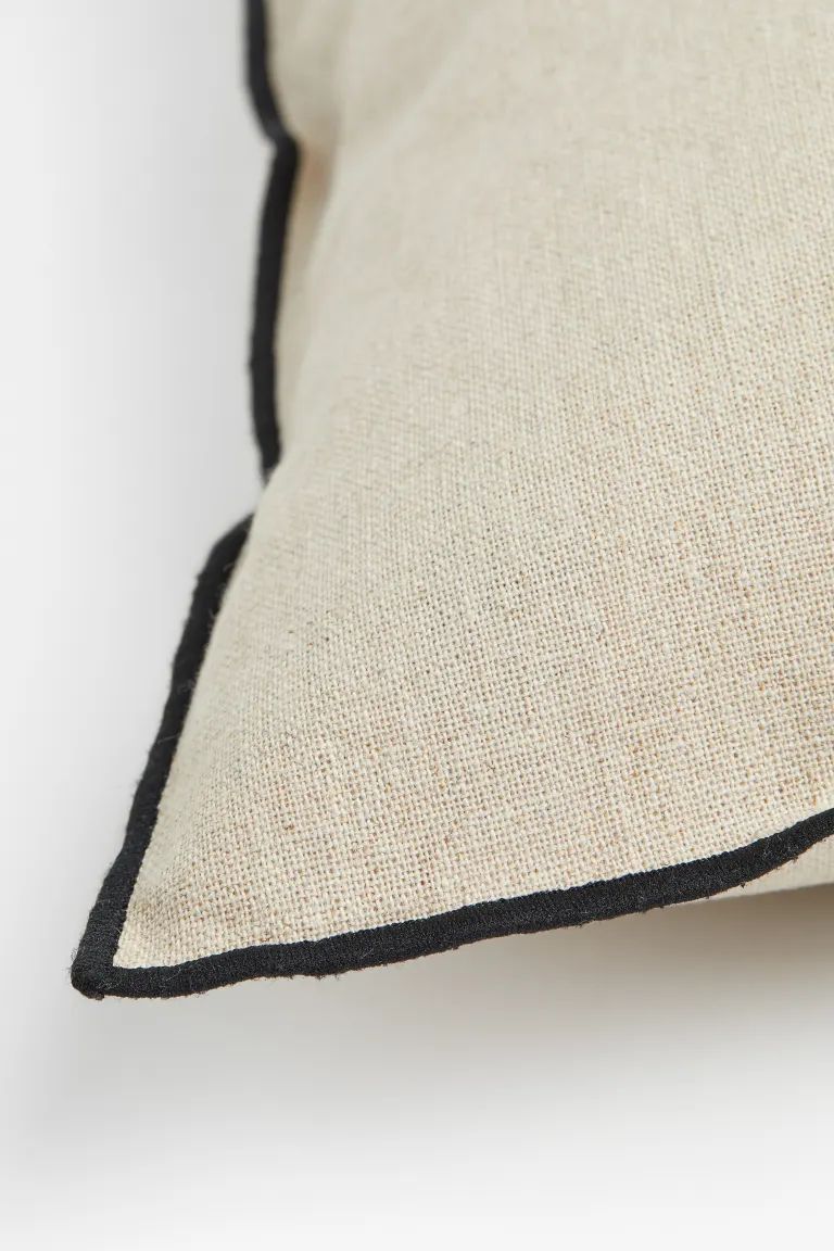 New ArrivalCushion cover in a linen and cotton weave with contrasting colour piping. Concealed zi... | H&M (US + CA)