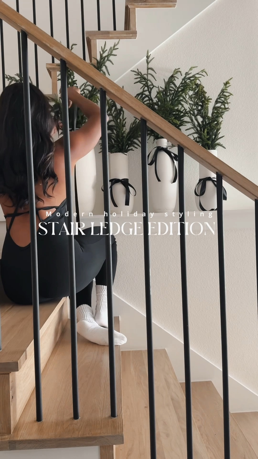 Holiday stair-ledge styling, but make it modern minimalist 🎄
White ceramic vases, black velvet bows,Norfolk  pine stems, and tall black taper candles — simple, clean, and elevated for the season.

If you’re decorating a small area or don’t have a fireplace mantel, this setup is such an easy way to add holiday charm without clutter. Everything is linked for you🤍#HolidayDecor #MinimalistChristmas #ModernChristmas #StairLedgeDecor #ChristmasHomeDecor #HolidayHomeTour #NeutralChristmas #ModernHomeDesign #HolidayAesthetic #ChristmasDecorIdeas 

#LTKHoliday #LTKHome #LTKSeasonal #LTKSeasonal #LTKHome #LTKHoliday