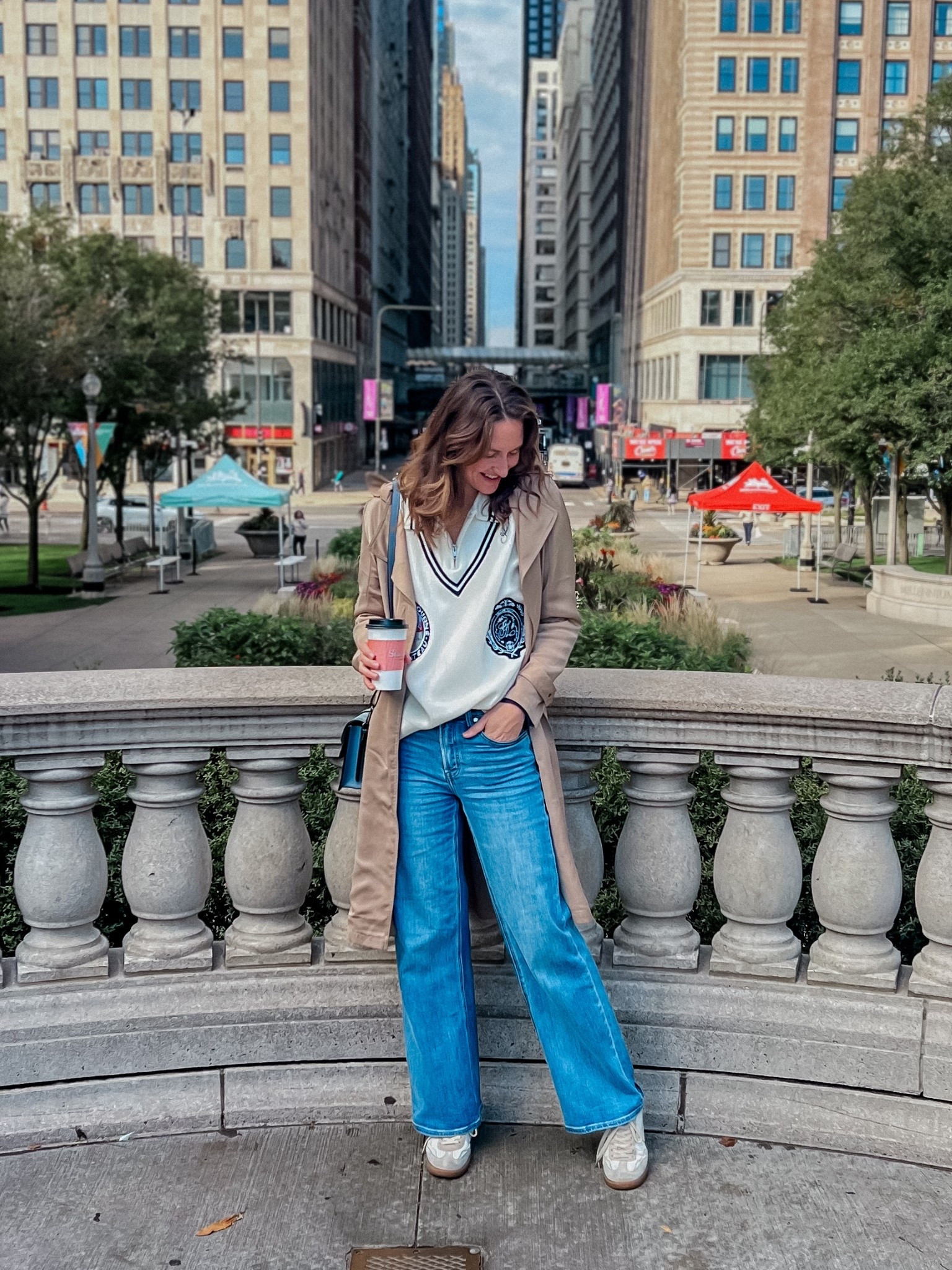 Can’t take the city out of the girl. 🥰 Loving this unisex sweater from Yellow The Label, especially paired with my favorite sneakers & trench coat. 

#LTKSaleAlert #LTKFindsUnder100 #LTKStyleTip