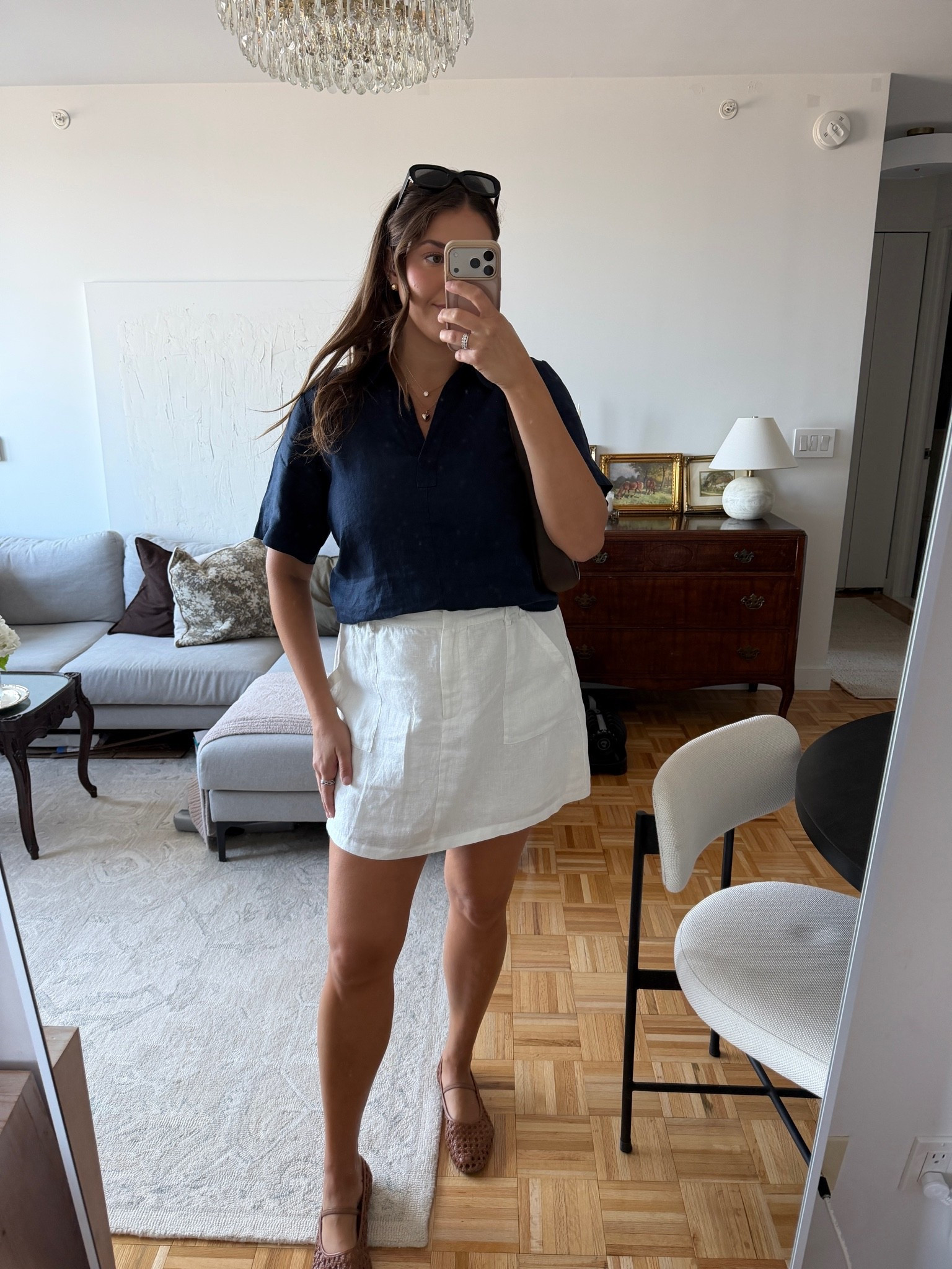 A classic navy and white combo that always works 🤍 The relaxed linen top, white mini skirt and woven Mary Janes feel polished, easy and perfect for warm late-summer days.

navy top, white mini skirt, woven flats, summer outfit, classic style, elevated casual, neutral outfit, linen outfit, transitional style, everyday fashion

#LTKTall #LTKSeasonal #LTKWorkwear