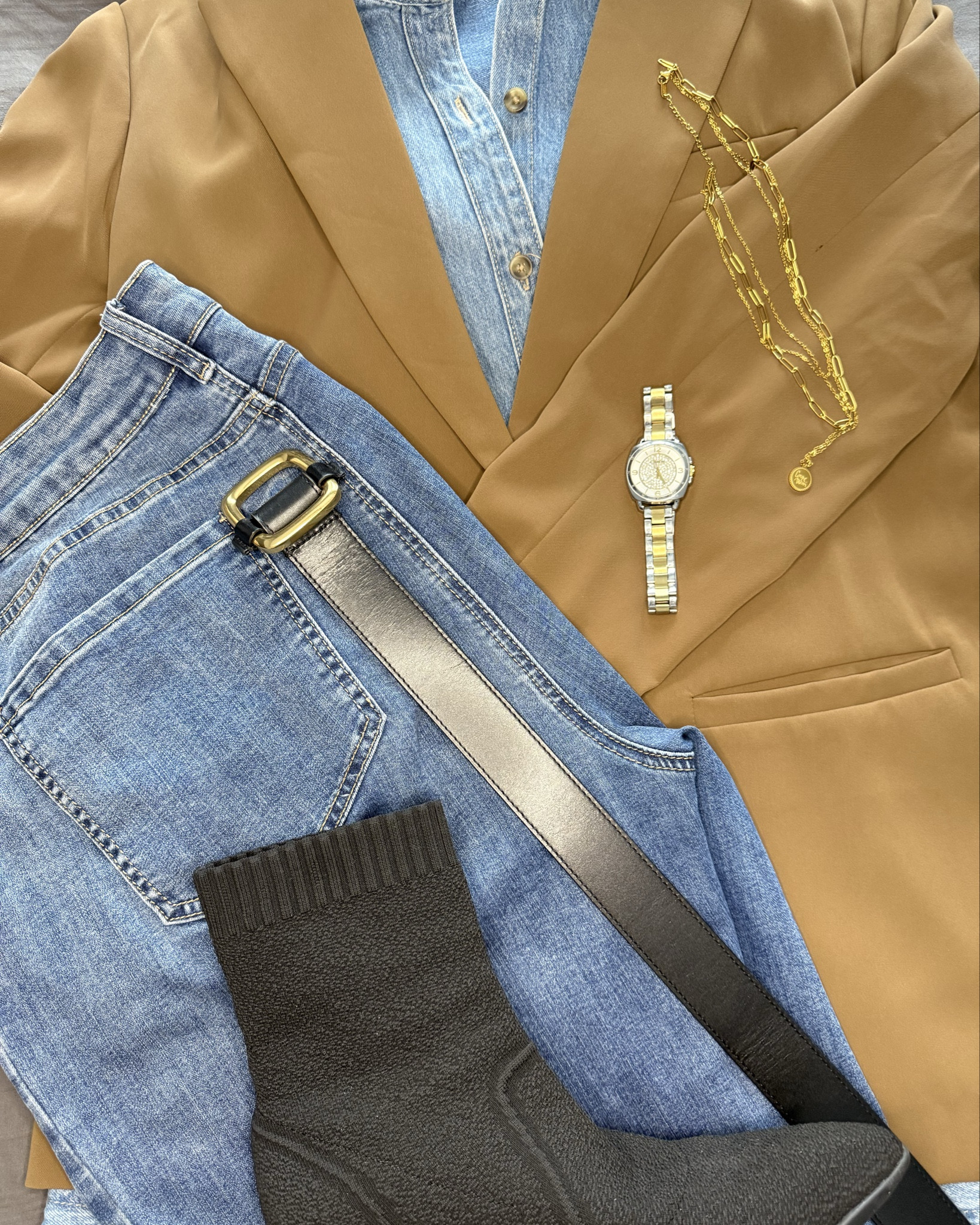 I was inspired by a Pinterest photo to put together a look that’s a little dressed up, and I think it turned out really well! Denim jeans with a denim shirt, a brown blazer, black belt, black shoes, and my bag—simple but polished.
Blazer -Amazon size Large
Jeans - Charlie B Size 14
Shirt - Old Navy size Medium
Boots - Cosy Island

#LTKover50style #LTKmidsize