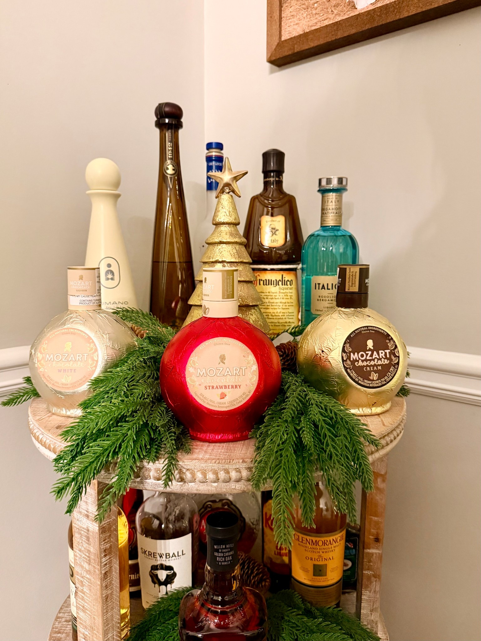 Holiday bar cart tip: choose liquor bottles that look as good as they taste 😂✨
I picked these because they fit perfectly with my Christmas décor — and ended up finding a few new favorites along the way.

Here’s what I’m loving right now:
• Mozart Chocolate Strawberry Cream Liqueur — festive and SO fun for holiday cocktails
• Italicus Bergamotto Liqueur — light, citrusy, beautiful bottle
• Humanos Blanco Tequila — quickly becoming my new favorite tequila (using it in my Cranberry Sage Margarita dropping this week!)

Linked all the bottles below if you want to stock your bar with some pretty (and delicious) holiday finds. 🍸🎄

#LTKHoliday #LTKHome #LTKSeasonal #BarCartStyle #HolidayEntertaining #ChristmasCocktails #HomeBarEssentials #BessieAndCo

#LTKHome #LTKSeasonal #LTKHoliday