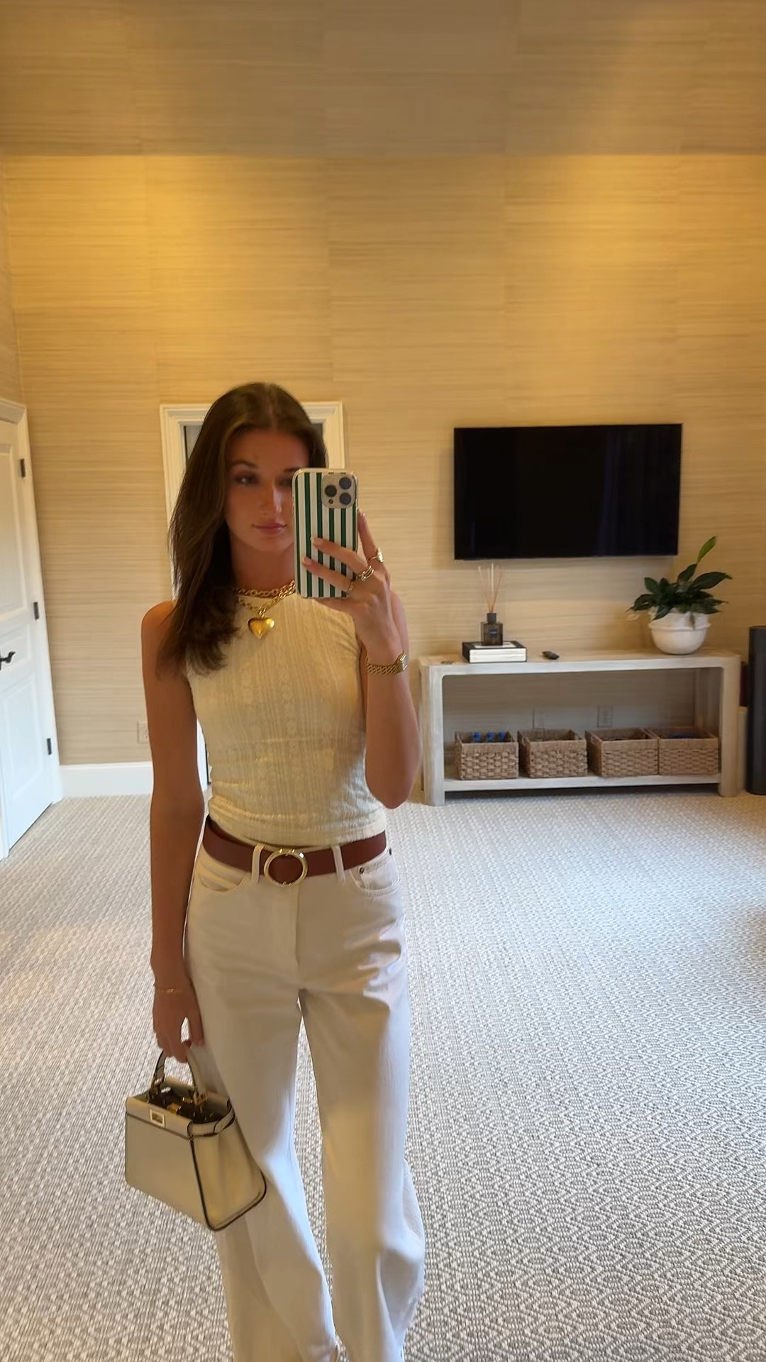 Tan belt outfit. White boot cut jeans. White top. White monochrome outfit. Dinner outfit. Fall fashion 2025. Outfit inspo. Work outfit. All white outfit with tan belt. Gold puffy heart necklace. White purse. Princess polly. Agolde. Revolve. Travel outfit. Ootd

#LTKStyleTip