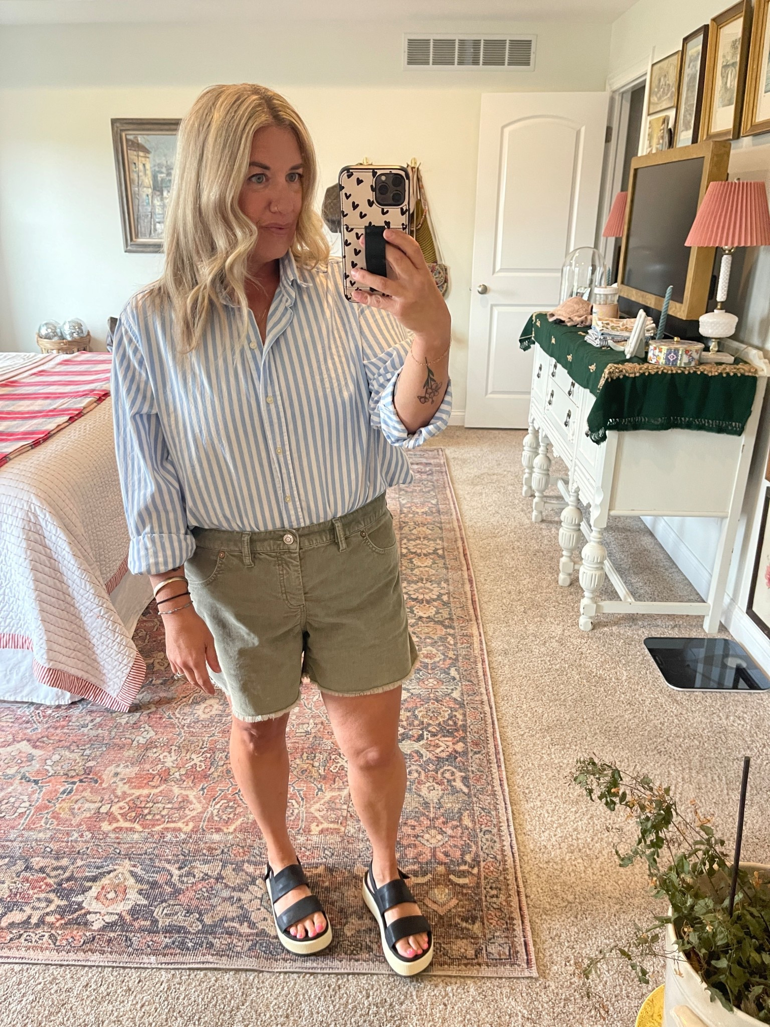 Fall transitional outfit. Striped shirt, green shorts, platform sandals 

#LTKOver40 #LTKMidsize #LTKShoeCrush