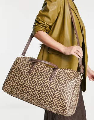 ASOS DESIGN oversized monogram print holdall | ASOS (Global)