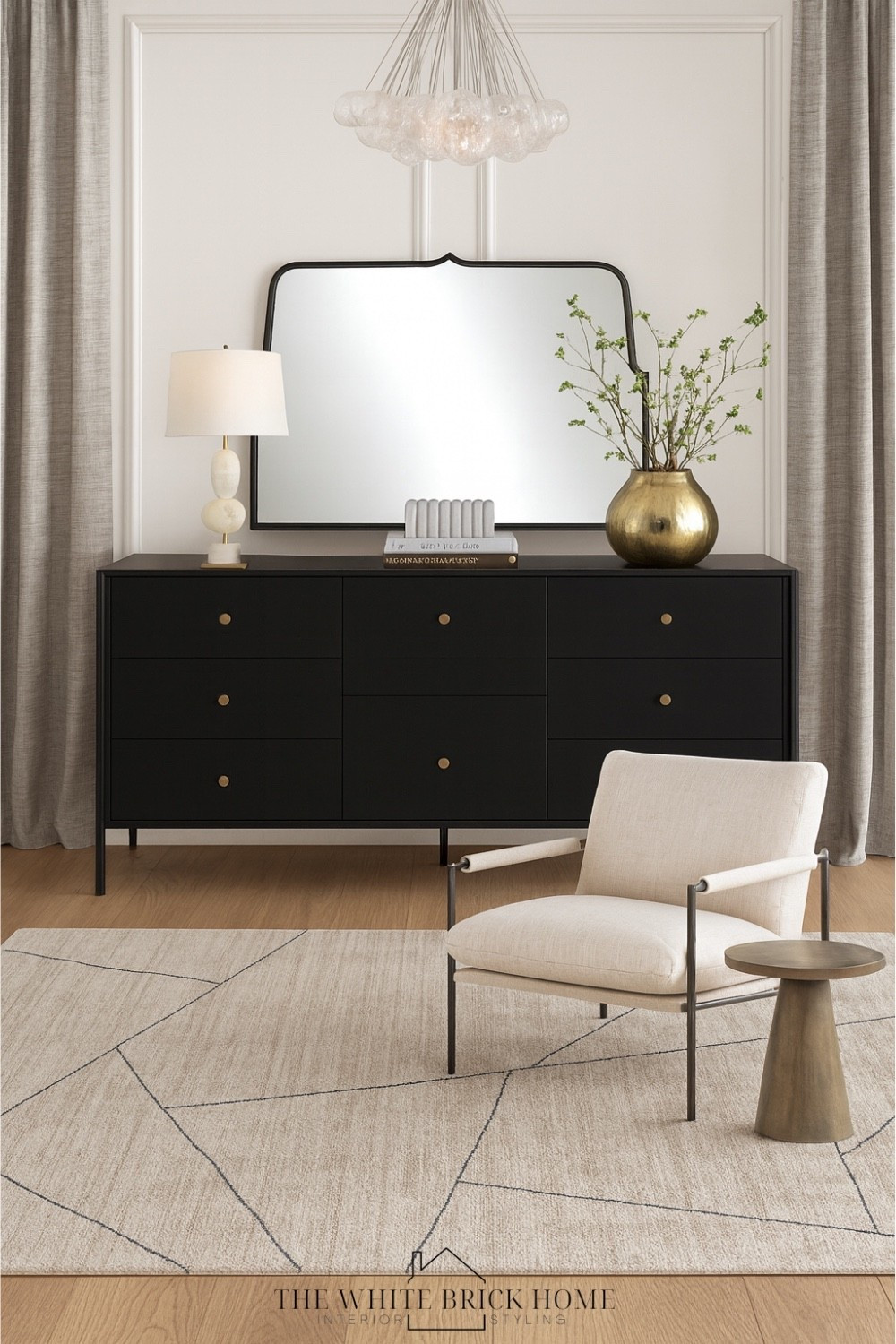 A mirror above the dresser instantly elevates the bedroom by adding height, light, and a polished focal point that complements the clean, modern styling of this dresser design. 

Bedroom, bedroom decor, bedroom dresser, bedroom rug, area rug, table lamp, dresser, greenery, wall mirror, bubble light, chandelier, drapes, home decor, home accents, decor accents, modern bedroom, modern room, home design, bedroom design, bedroom decor ideas, Wayfair, pottery barn, Amazon, crate and barrel 

#LTKHome #LTKGiftGuide #LTKHoliday