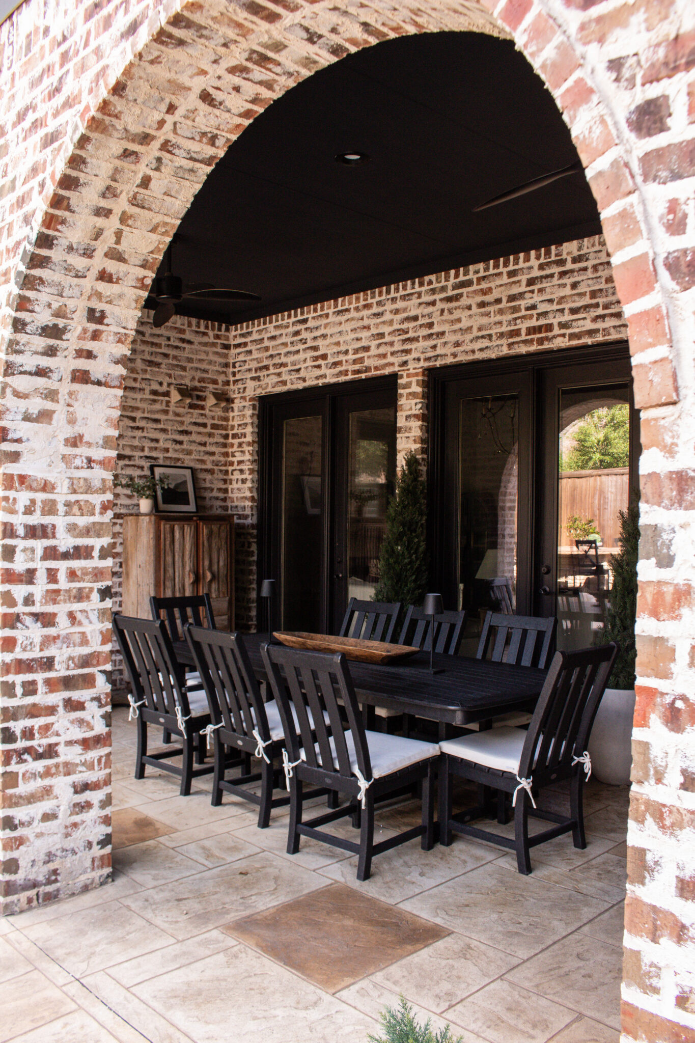 This backyard is proof that a simple black and white color palette never goes out of style. Classic outdoor furniture, cozy conversation areas, beautiful planters, and functional entertaining spaces make this one of my favorite outdoor designs.

#LTKSeasonal #LTKHome
