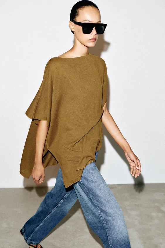 Cape-style top made from a viscose blend yarn. Features a round neck, fluid short sleeves, and an... | Zara US