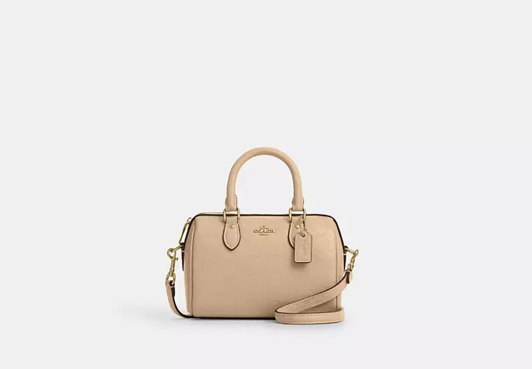 Coach Outlet Mini Rowan Crossbody Bag In Signature Leather - Beige | Coach Outlet US
