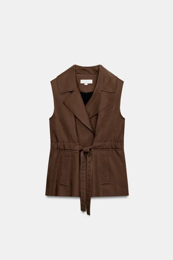 Model height: 176 cmWaistcoat made with linen. Featuring a regular collar, sleeveless design, fro... | Zara UK