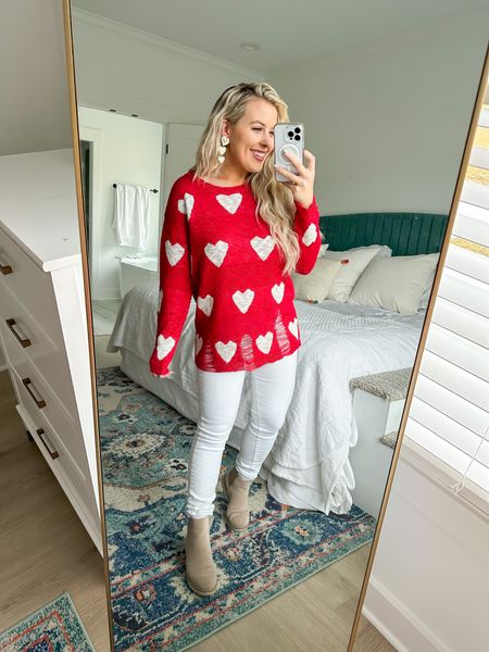 Amazon heart sweater, size medium! Pairs perfectly with white jeans and booties for a comfy Valentine’s Day fit!
#valentinesday #vaentinesdayoutfit #holidaystyle #winterstyle #winterfashion 

#LTKSeasonal #LTKstyletip #LTKfit