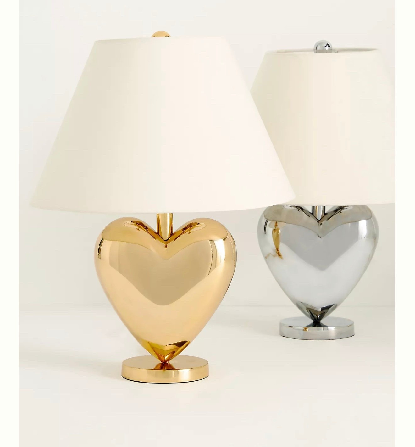 The Icon Table Lamp: Heart Edition

This table lamp features a metallic heart-shaped base paired with a simple cotton shade for a stylish, contemporary look

#LTKSeasonal #LTKHome