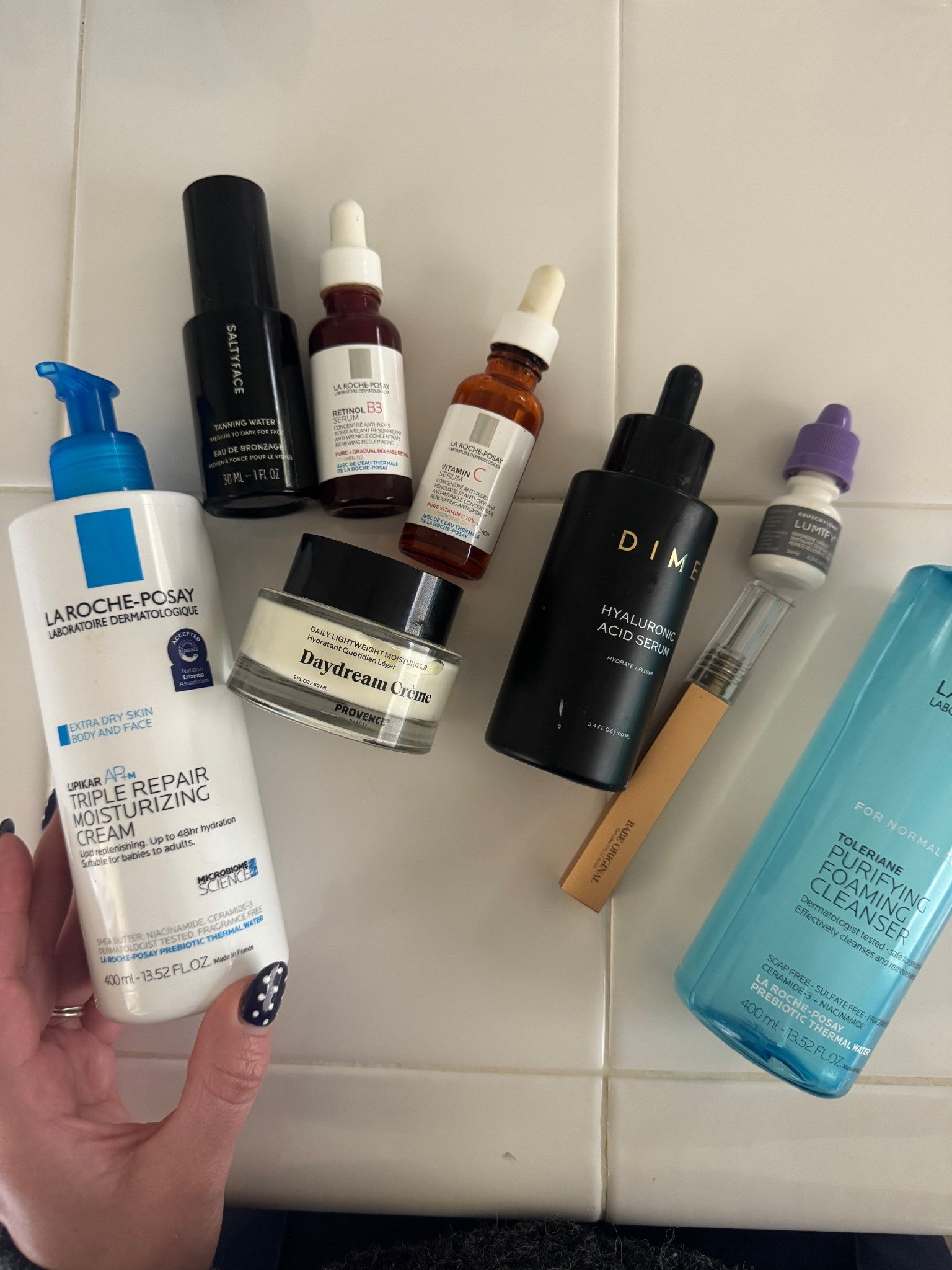 
My oily-skin skincare routine (night to day) that I actually stick to 👇🏼 Sharing everything in the exact order I use it, thinnest to thickest, because layering matters.

🌙 NIGHT ROUTINE (repair + moisture):
I start with the Purifying Foaming Cleanser from La Roche-Posay to cleanse without stripping. Then I go in with the Retinol B3 Serum from La Roche-Posay (more expensive, but it lasts forever and has never broken me out). After that, I use Salty Face Spray. I love it, but it’s pretty pigmented, so I only use it about once every 3 days. Next is the La Roche-Posay Triple Repair Moisturizing Cream, which I never thought I’d need as someone with oily skin… but as I’m maturing (lol), I’ve realized my skin needs more moisture, not less. Locking in hydration overnight genuinely makes my skin look more youthful. I finish with Babe Lash Serum, my favorite because it doesn’t change eye color.

☀️ DAY ROUTINE (lightweight + glow):
In the morning, I use the Vitamin C Serum from La Roche-Posay (pricey, but lasts a long time and my skin tolerates it perfectly). Then I apply Hyaluronic Acid from DIME Beauty , hands down my favorite HA ever. I’ve been using it for six years and have never switched. I follow with Daydream Cream from Province Beauty, which is newer to me but so good: lightweight, hydrating, and perfect for oily skin. I finish with Lumify eye drops to brighten everything up.

If you have oily or acne-prone skin but still feel dry, this routine has been such a sweet spot for me. I’ll link everything I use 🤍

#LTKmorningroutine #LTKBeauty #LTKgrwm