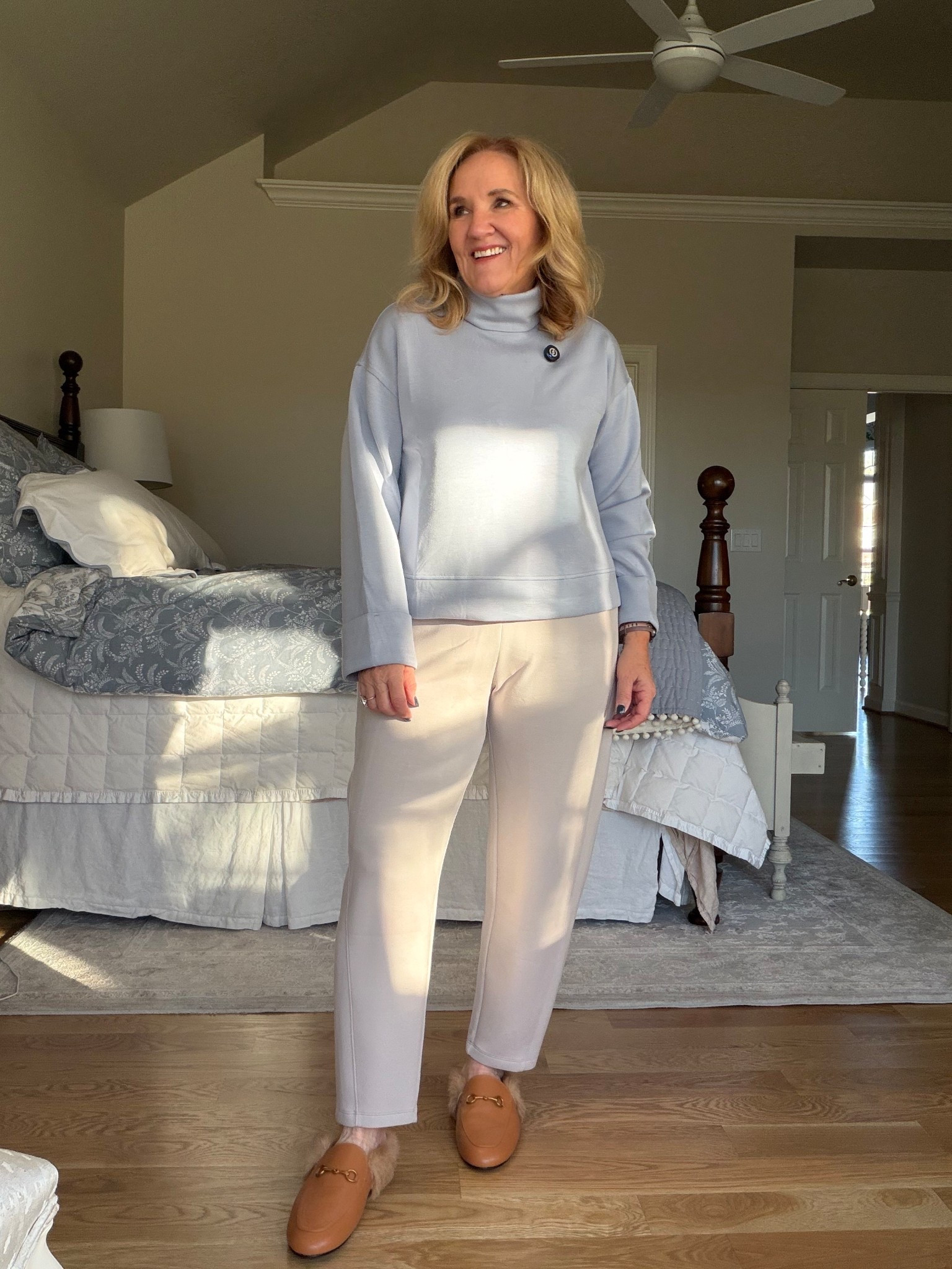 Spanx air essentials turtleneck in a new color! Size medium there are some colors in this turtleneck that are on sale with an extra 30% off on top of the sale price
The barrel air essential pant. I’m wearing a medium petite and this French gray color is on sale. It also comes in a turtleneck so you could get a matching set. I would act fast.

What do you think about the faux for mules? These are from Amazon. They’re true to size. They’re pretty comfortable, but they don’t have a lot of cushion. But they are really soft. I think I would wear them more like a house slipper rather than out and about.

#LTKOver40 #LTKPetite #LTKootd
