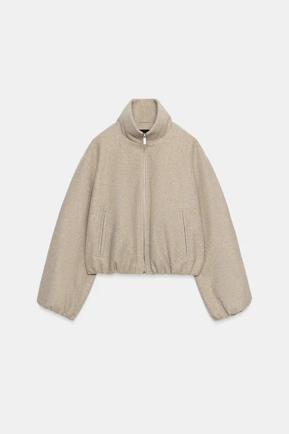 Bomber jacket with a high collar and long sleeves. Featuring double welt front pockets, gathered ... | Zara UK