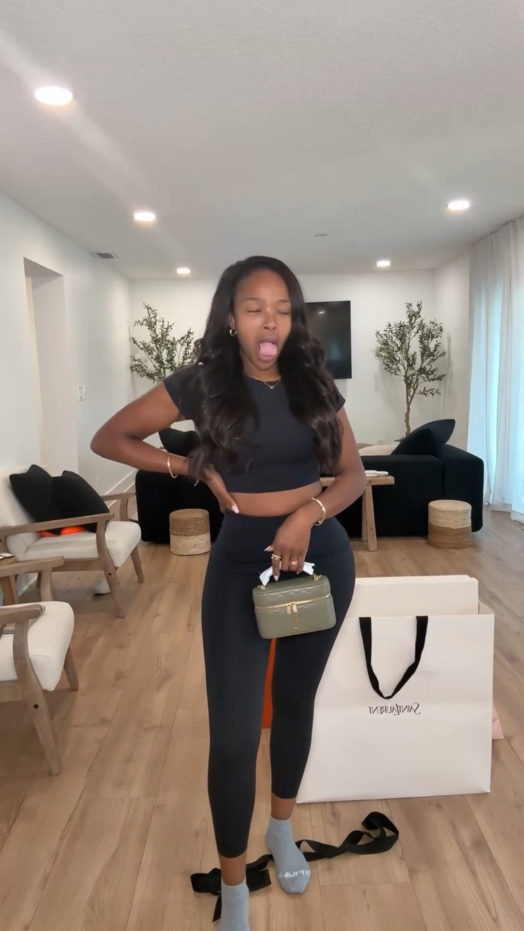 Hi babes! 🖤

Okay this is EXACTLY what I mean by an affordable hero piece paired with luxury energy. A good black active set will forever be one of the smartest things to have in your closet because you can throw it on and still look instantly put together.

The fitted crop + high waist leggings combo snatches everything while the structured mini bag elevates the whole vibe from “running errands” to “model off duty.” Homegirl… this is the type of outfit you wear once and suddenly need in every color.

Where to wear this:
• Coffee runs
• Airport travel days
• Pilates or gym days
• Casual shopping trips
• Everyday errands while still looking cute

Affordable basics styled with elevated accessories = lower cost per wear and endless outfit repeats. These are the pieces that actually get worn nonstop.

Everything is linked below ✨

xx Kira | IG: KirasFashionFinds

5’4 | 140LBS | 34D-27-40 | size small

#LTKstorytime