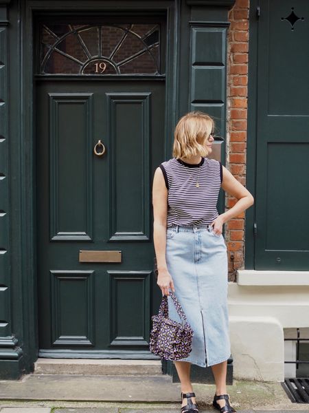 Striped tshirt, tank top, denim skirt, slit skirt, fisherman sandals, necklace, floral pattern bag 

Wearing 12 in tee and skirt

#LTKstyletip #LTKSeasonal #LTKeurope