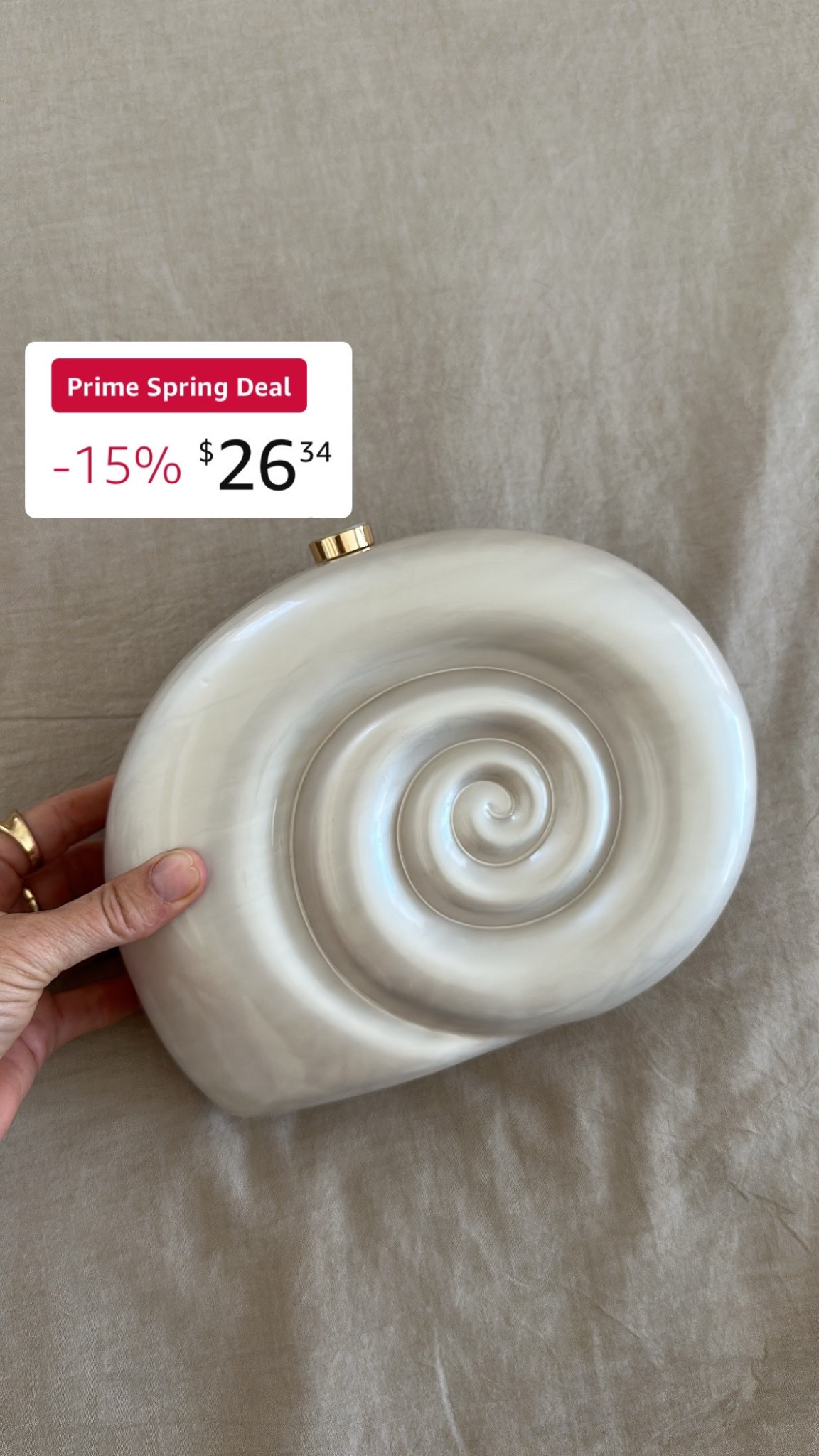 Adorable shell clutch on deal

#LTKStyleTip #LTKSaleAlert #LTKFindsUnder100