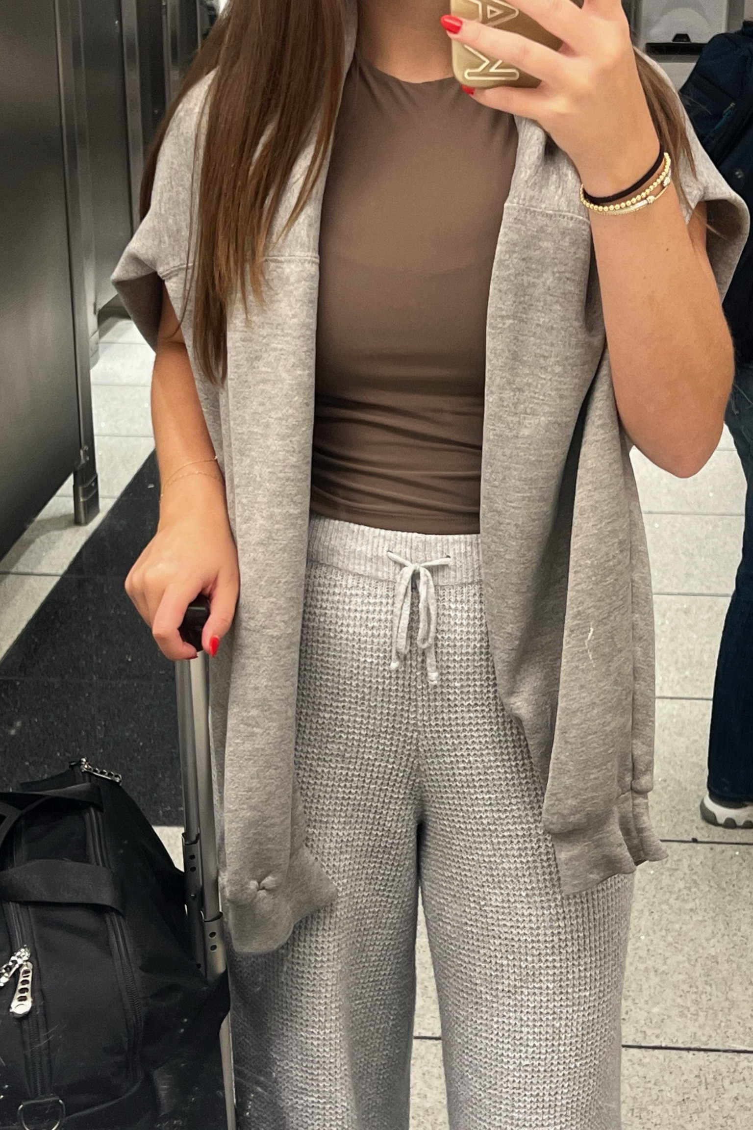 Stopped by Target recently & found this $12 skims dupe top that I wore to the airport today 😍

#LTKFitness #LTKWorkwear #LTKFindsUnder50