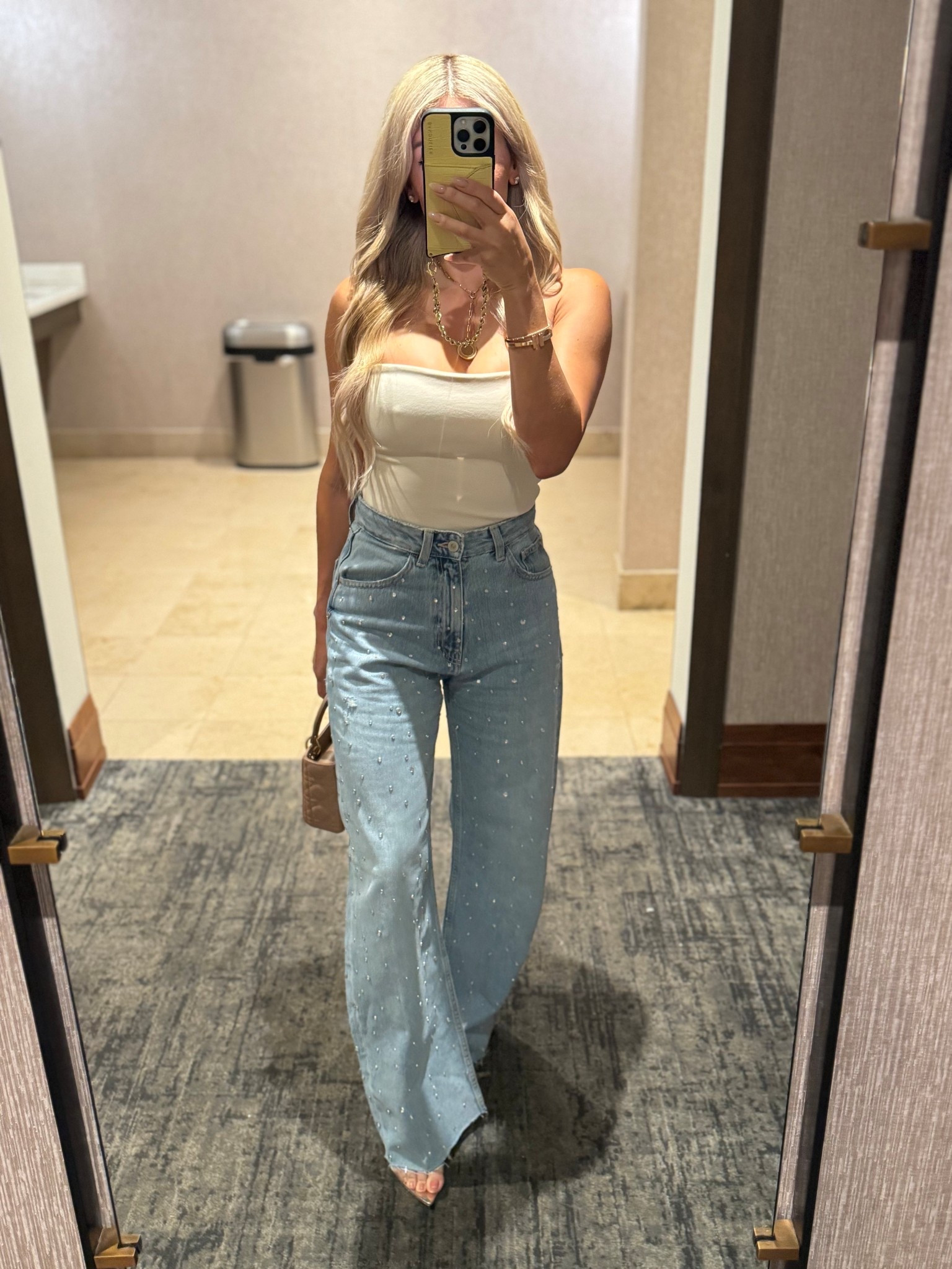 This night out I kept it casual as we were meeting friends out post UT football game but brought the sparkle to transition in to the night and paired it with a strapless top! 

#LTKOver40 #LTKStyleTip #LTKTravel