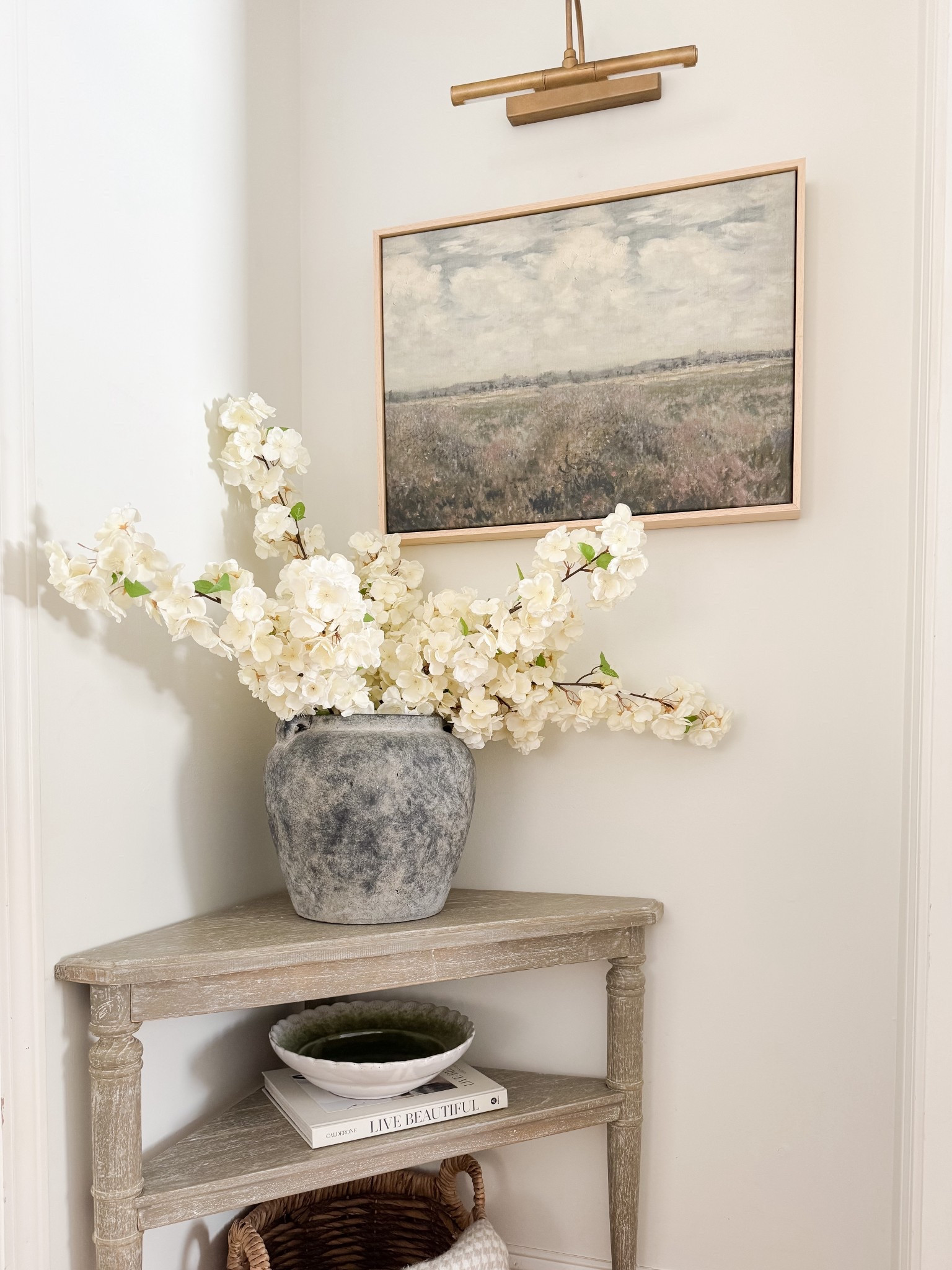 Spruce up a little corner in your home with these decor ideas! Adding a small table, faux florals, and some artwork can go a long way. I love this table from Amazon and think it fits perfectly in this nook. Linking everything here! 

#LTKHome