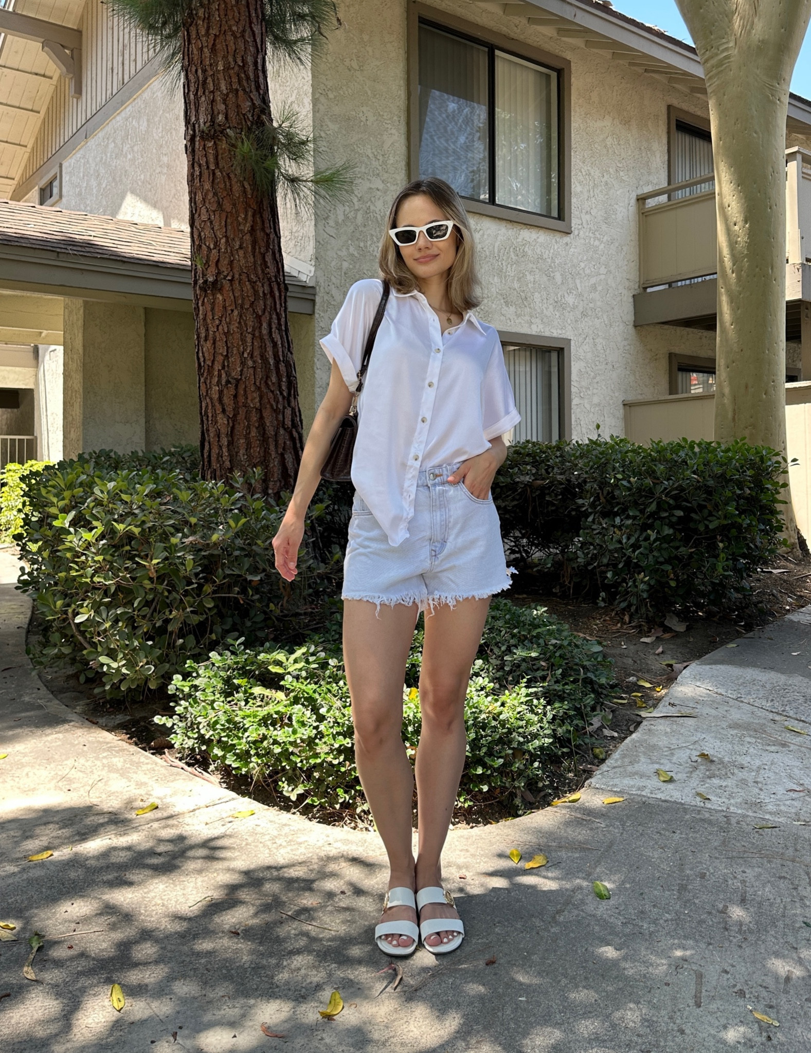 The perfect summer look! Light denin & white look SO good together!

Denim shorts, white sandals, white slippers, shoes and accessories, crossbody bag, white cat eye sunglasses, white button up shirt, Zara finds

#LTKSeasonal #LTKFind #LTKstyletip