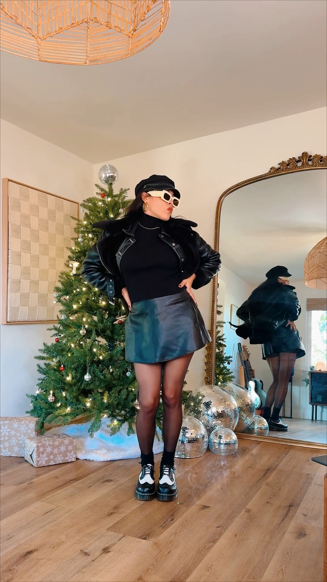 All black winter outfit with big faux leather biker jacket 

#LTKSeasonal #LTKHoliday