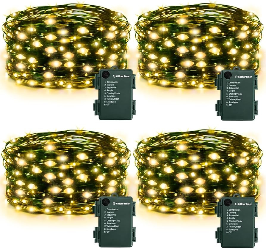 KOUQIYA Christmas Fairy Lights 4 Pack, 18ft 50 LEDs Battery Starry Light with Timer 8 Modes Water... | Amazon (US)
