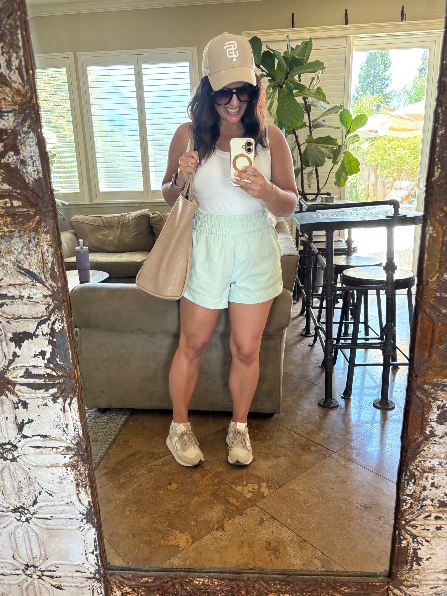 Soccer camp for my girl today. I walked laps on the track for the first half. My sneakers are so comfy, I highly recommend. My tote bag is perfect for busy moms. It literally holds everything and looks much more luxurious than the affordable price. 

#LTKActive #LTKPetite #LTKOver40